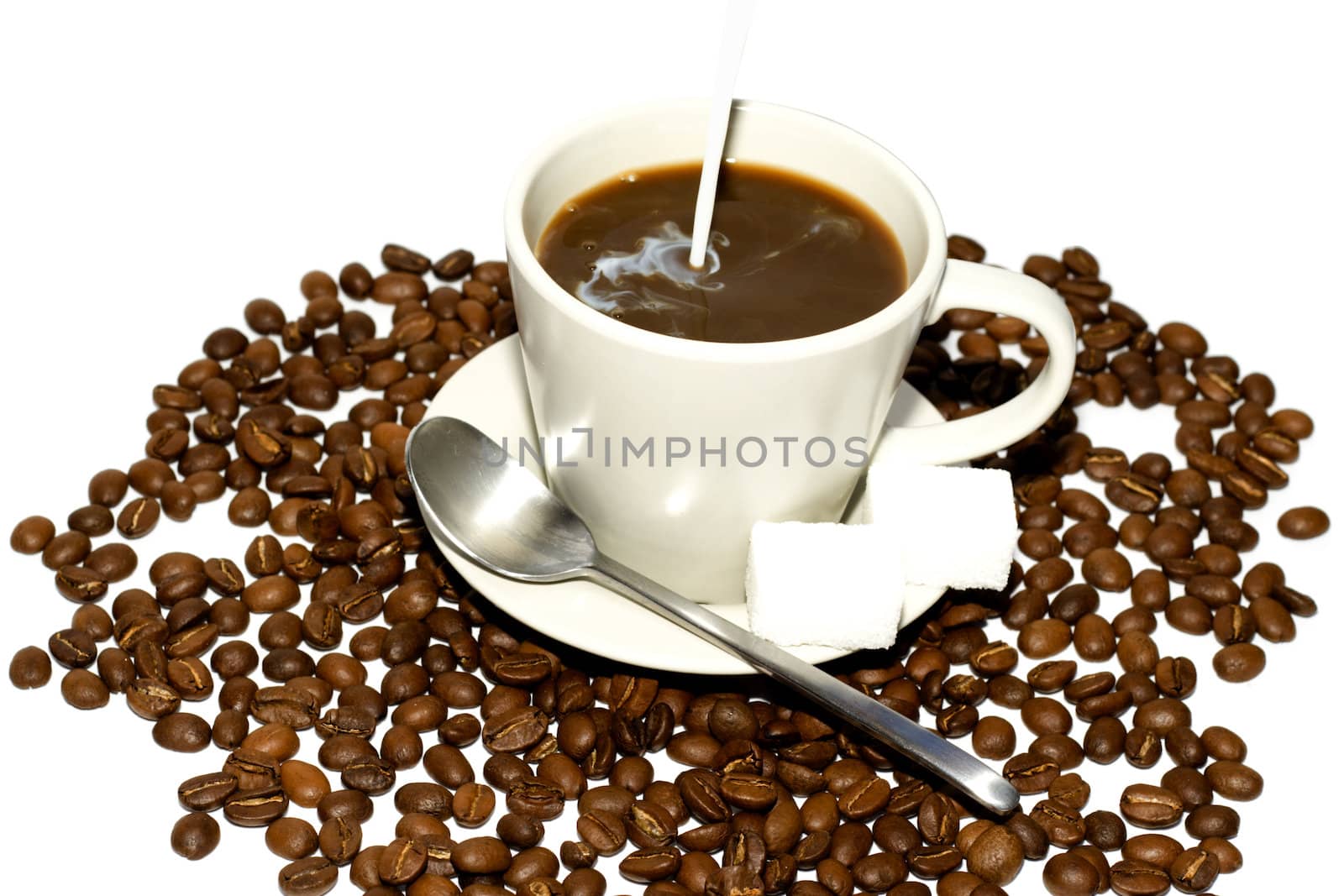 Cup of coffee on coffee grains