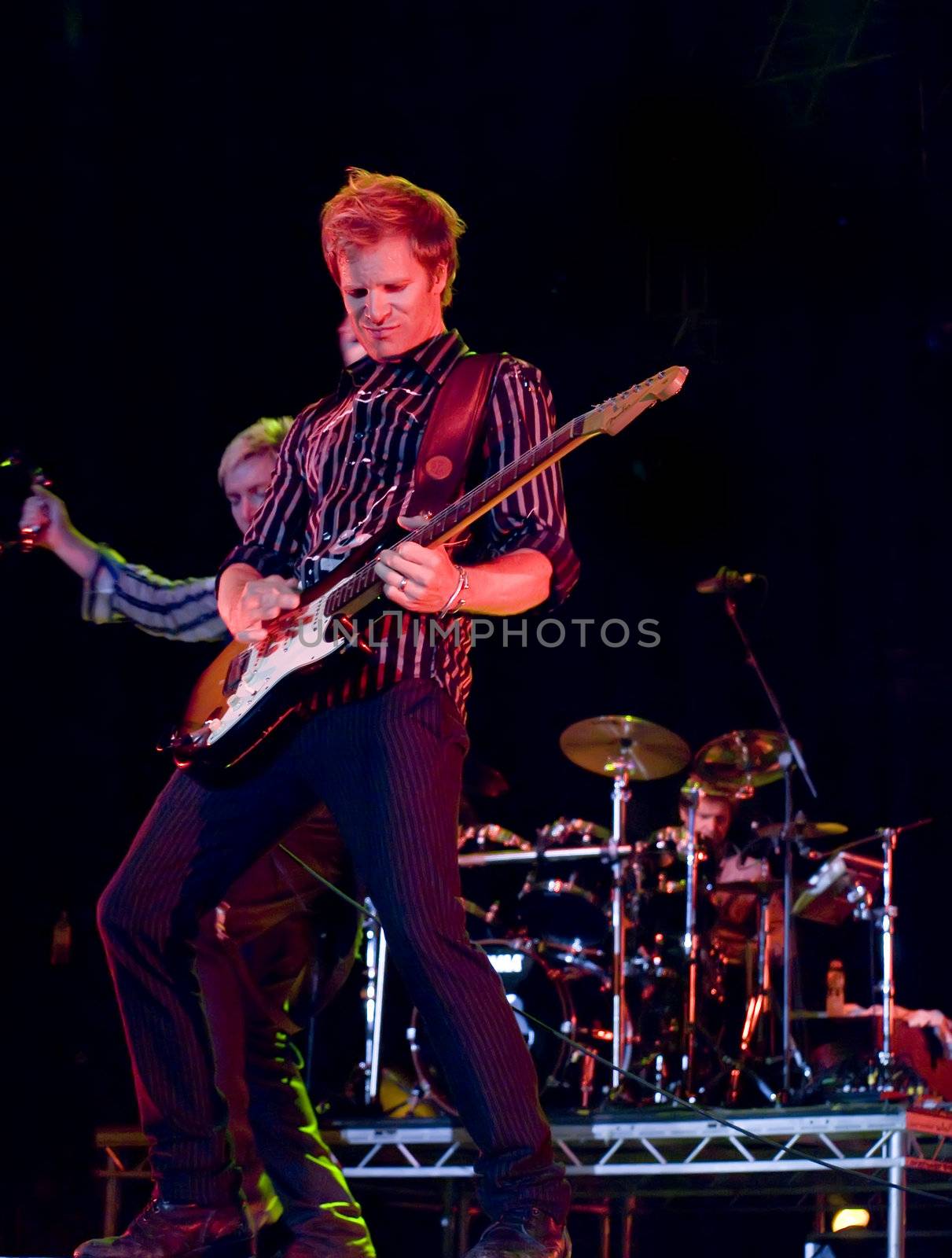 Duran Duran guitarist Dom Brown live on stage in Malta on 26th July 2008 during Red Carpet Massacre Tour