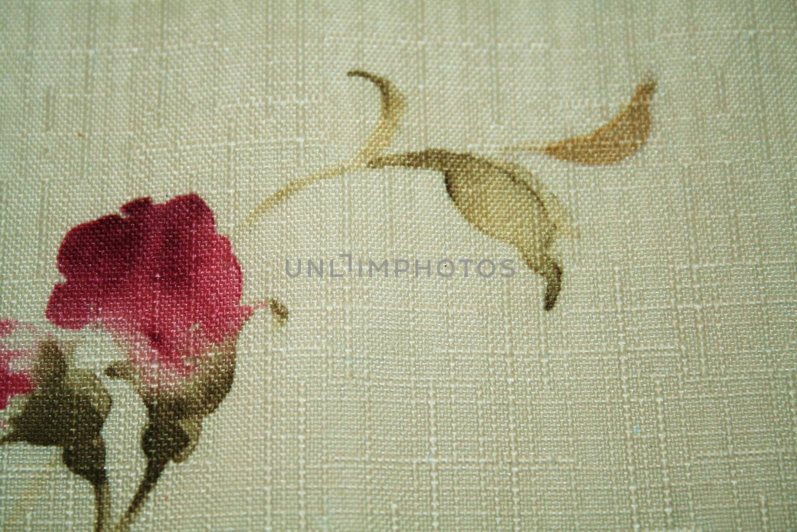 A flower print on cloth with texture.