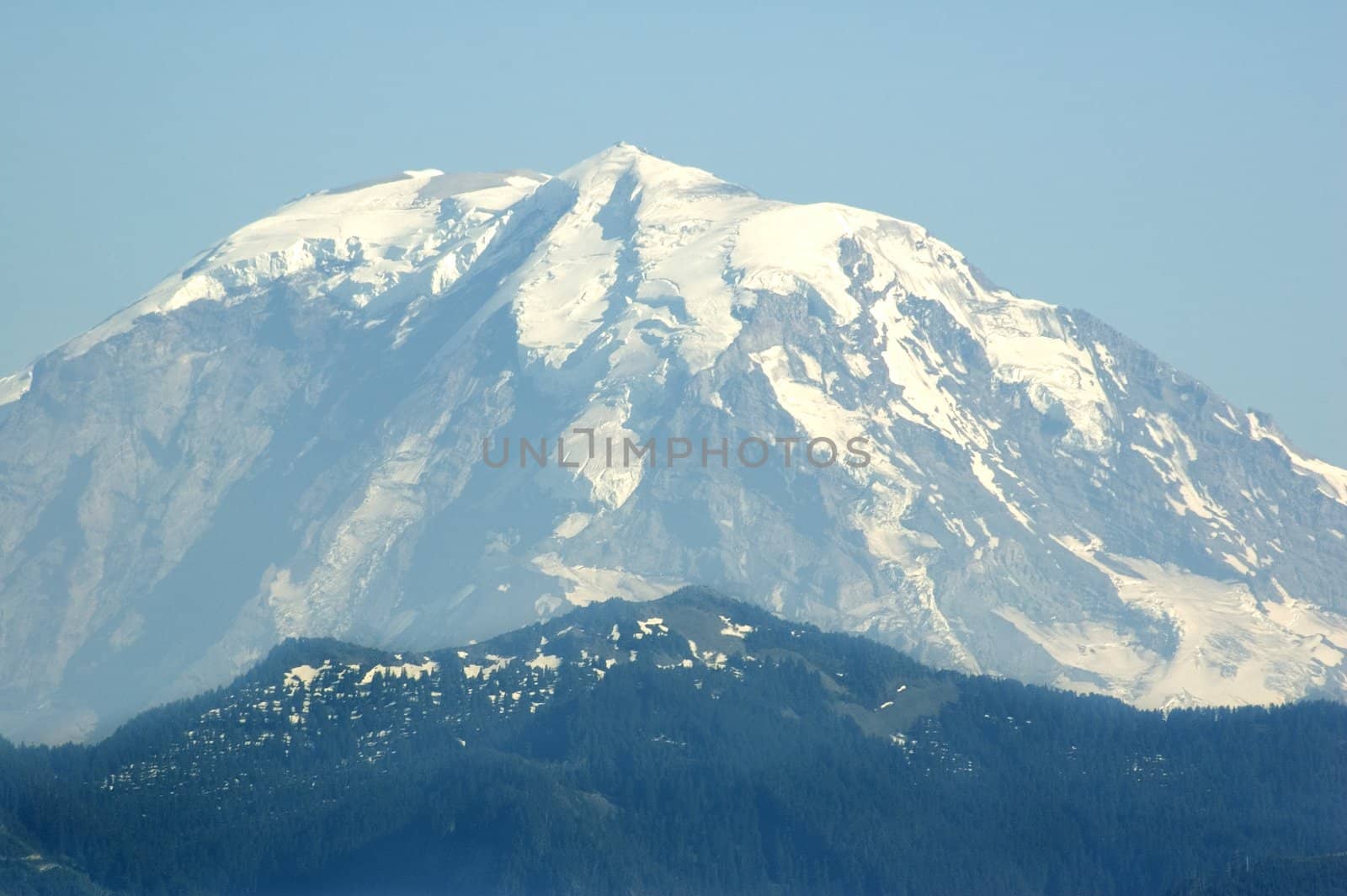 The peak of Mount Rainier from approximately 50 miles away.