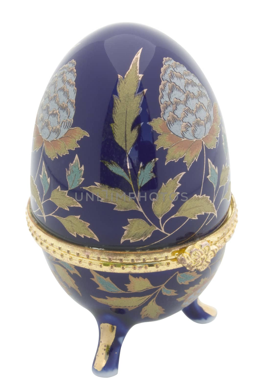 Ceramic casket as eggs faberge dark blue color with gold furnish it is isolated on a white background.