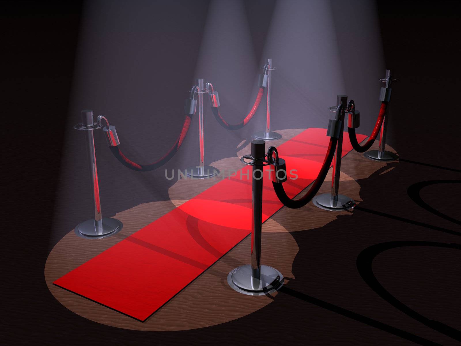 A red carpet with stanchions and spot lights.