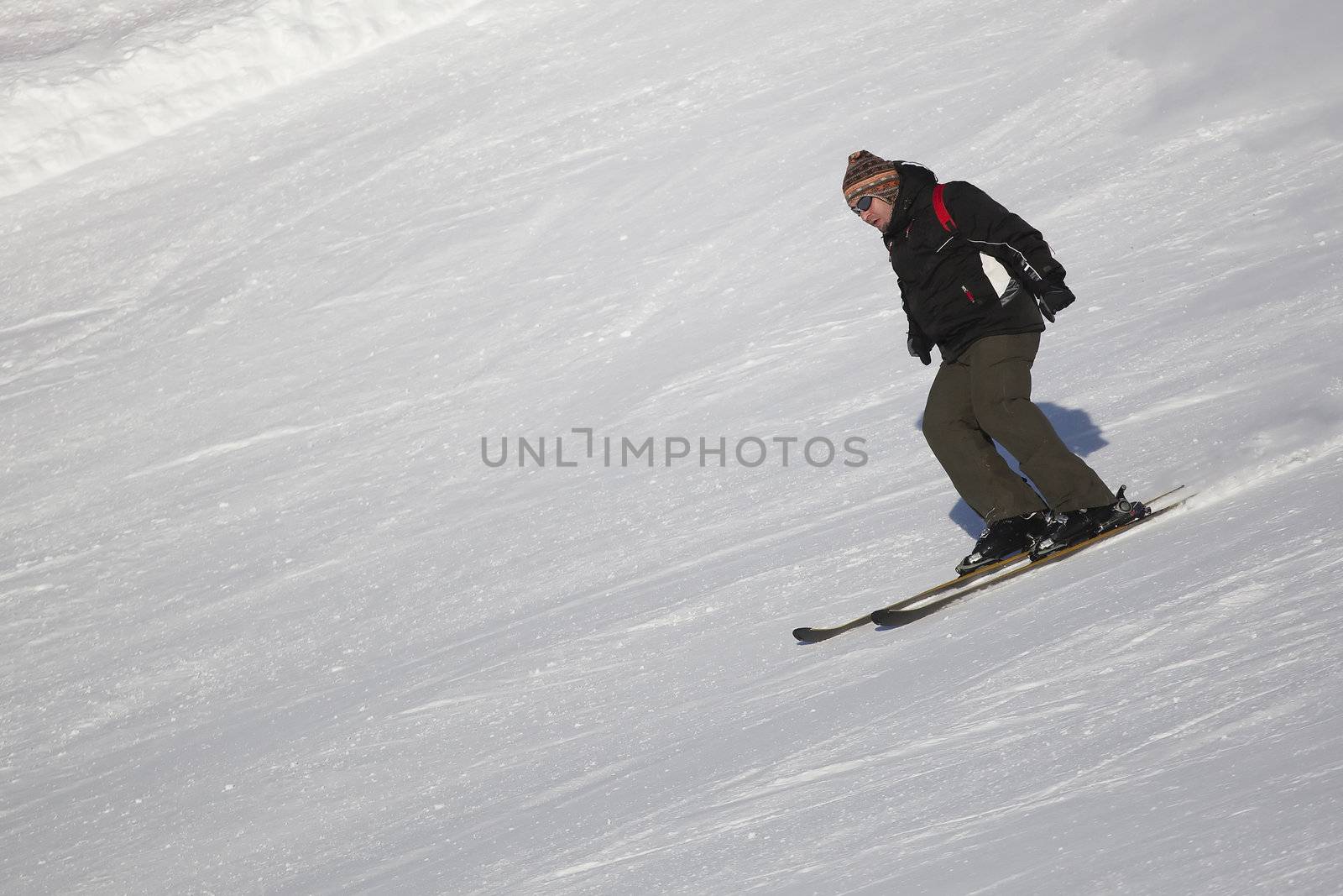 man skiing on the slope - italian dolomites