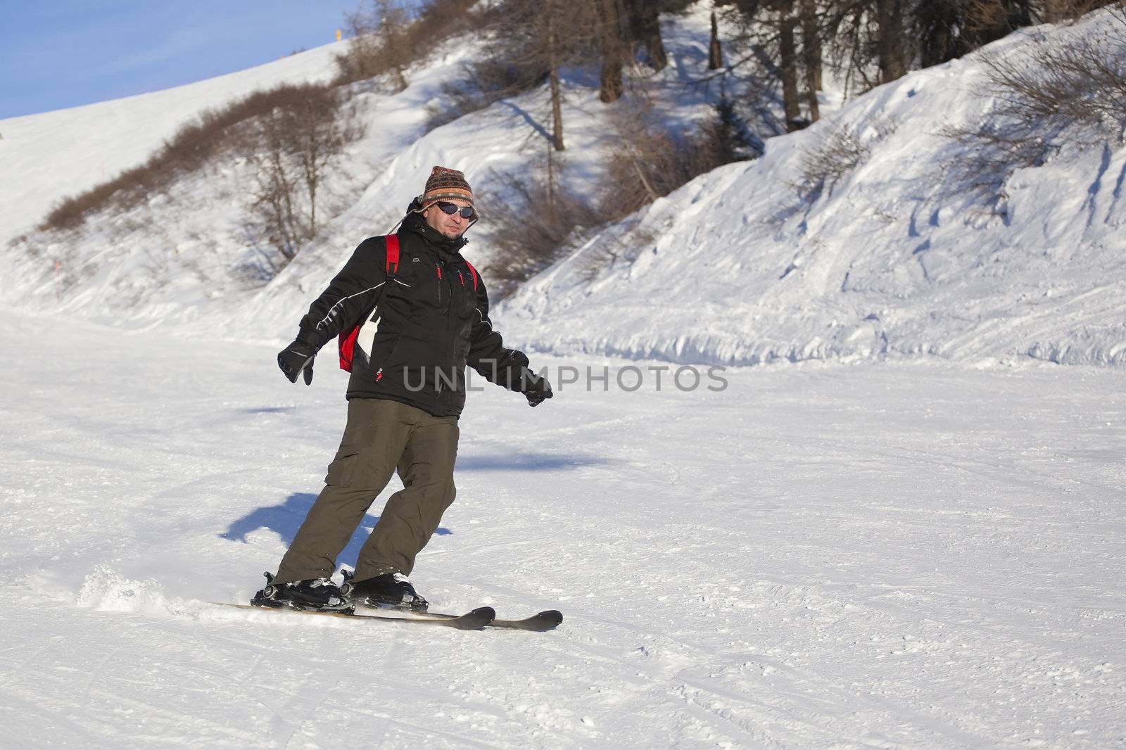 man skiing on the slope - italian dolomites