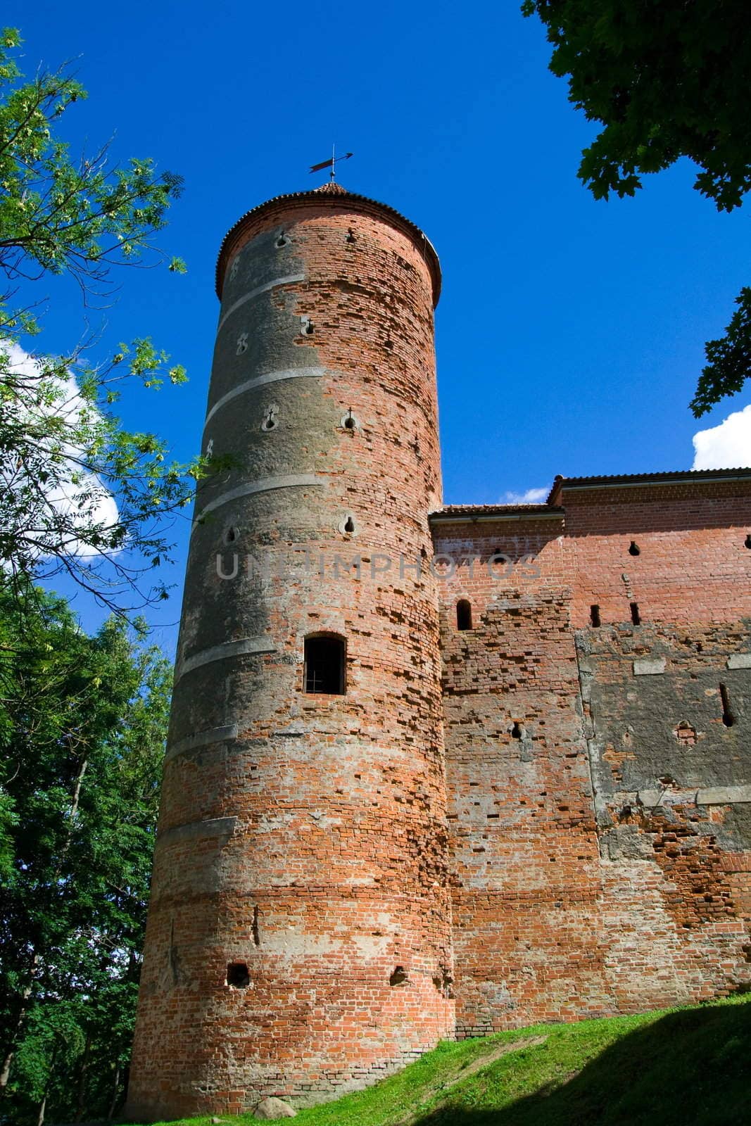 Tower of castle Panemune against blue sky