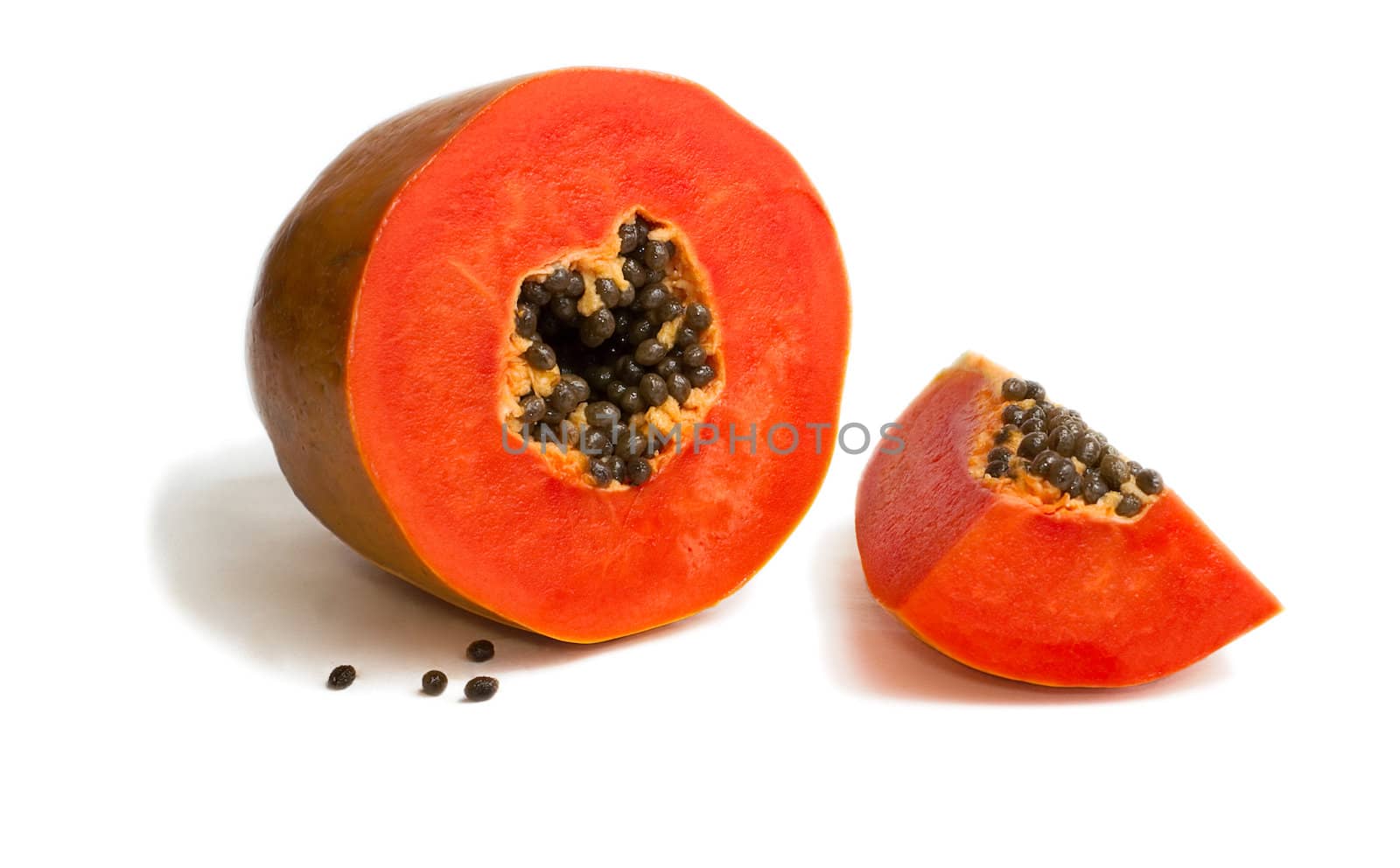 Slice of bright orange sweet mellow papaya isolated on white