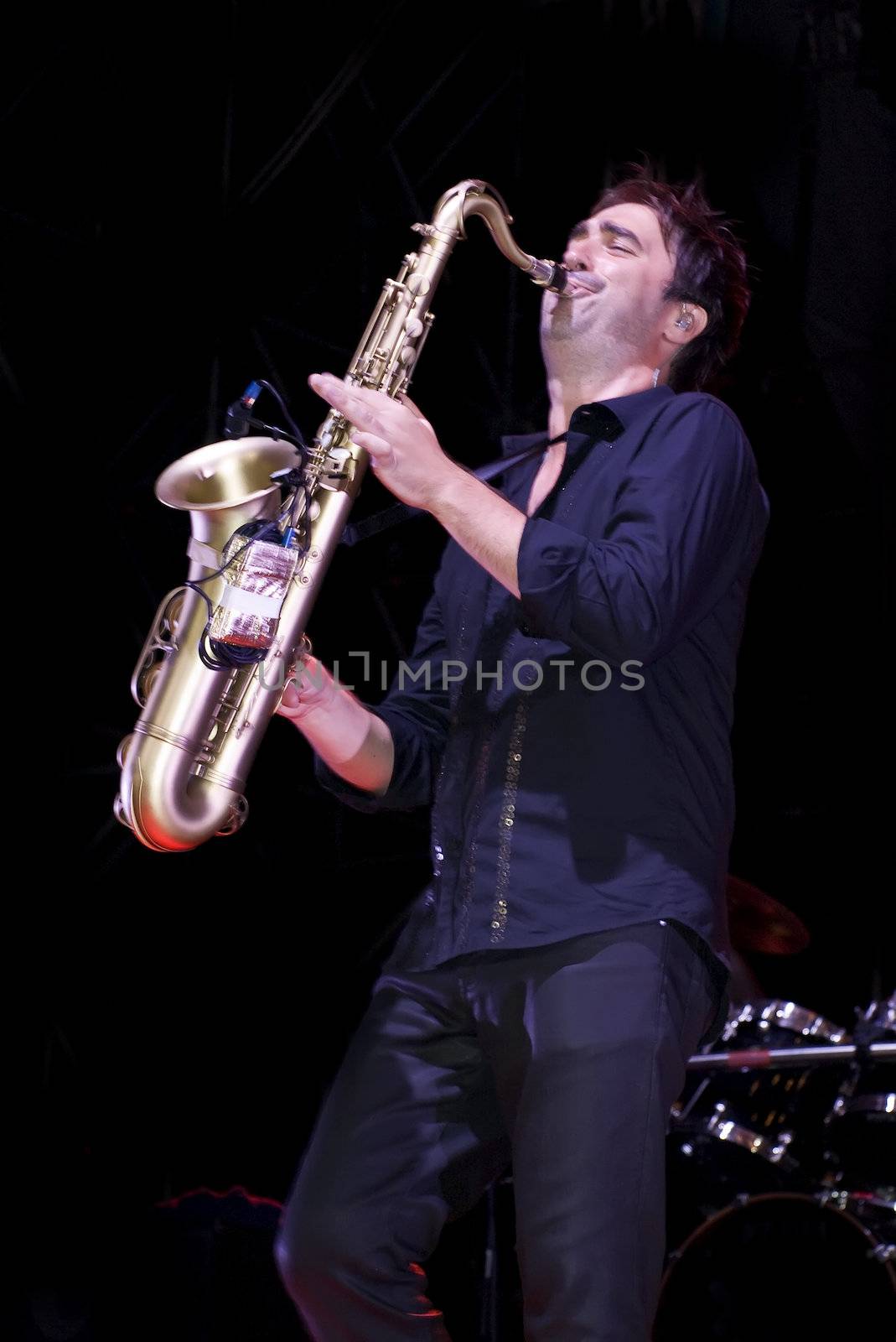 Duran Duran saxophonist Simon Willescroft live on stage in Malta on 26th July 2008 during Red Carpet Massacre Tour