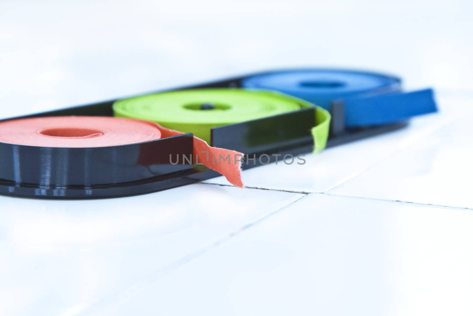 Indicator paper on a lab faience desk.Selective focus on the red torn end. 