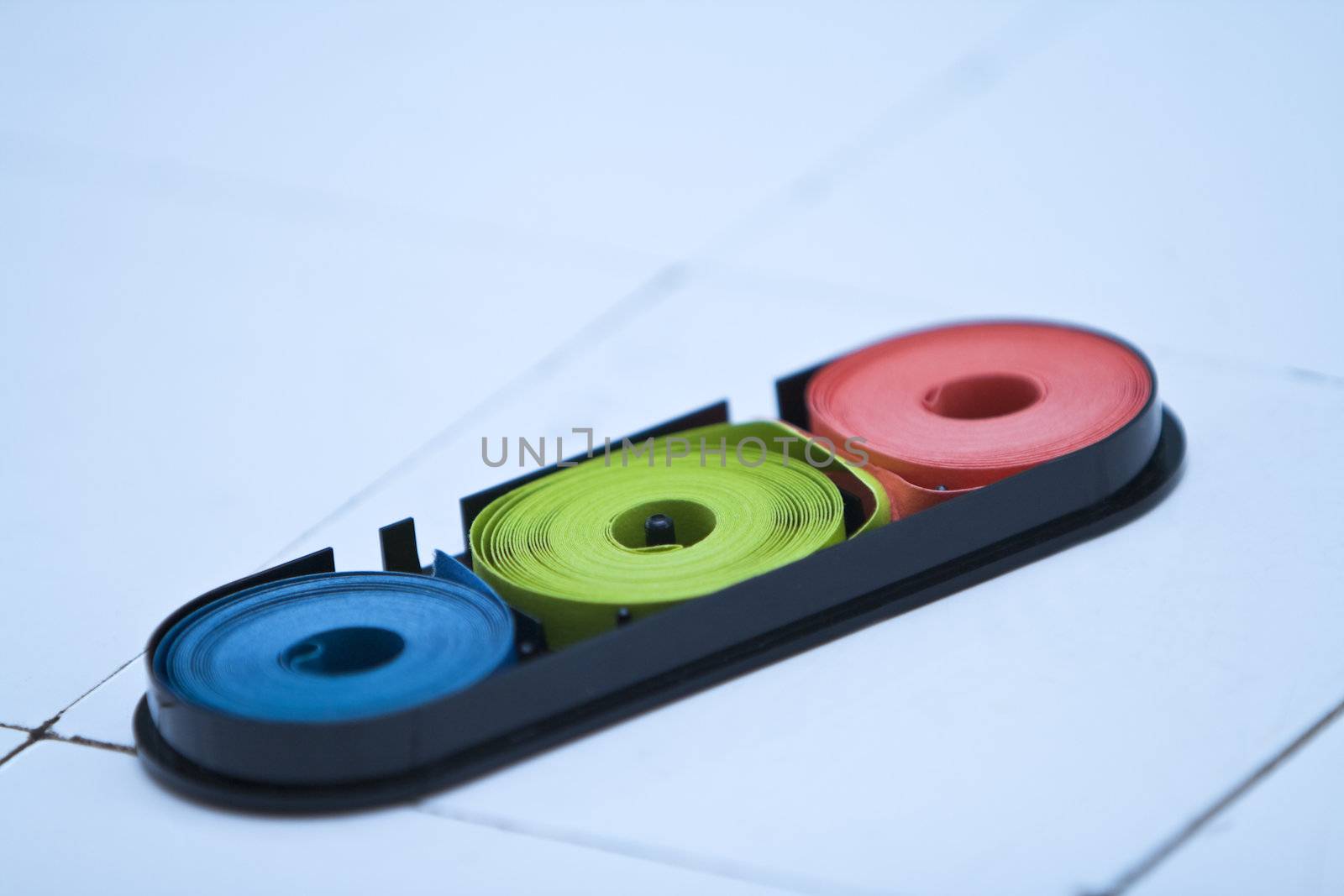 Indicator paper on a faience lab desk.