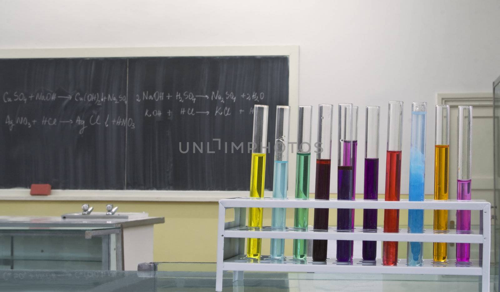 Image from a chemistry laboratory room.The focus is on the tubes stand.