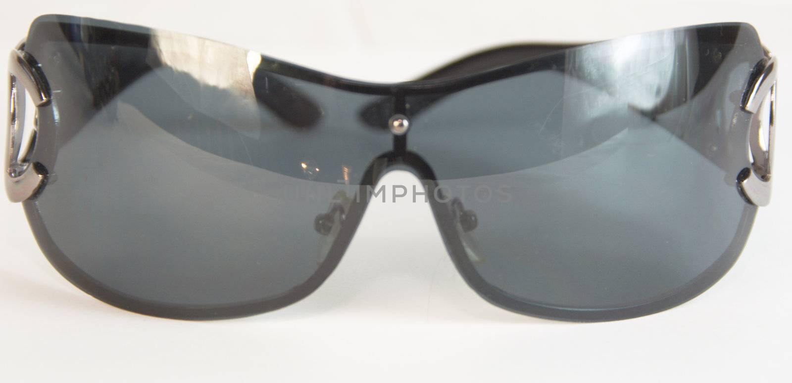 Black glasses for protection against the sun by Dominator