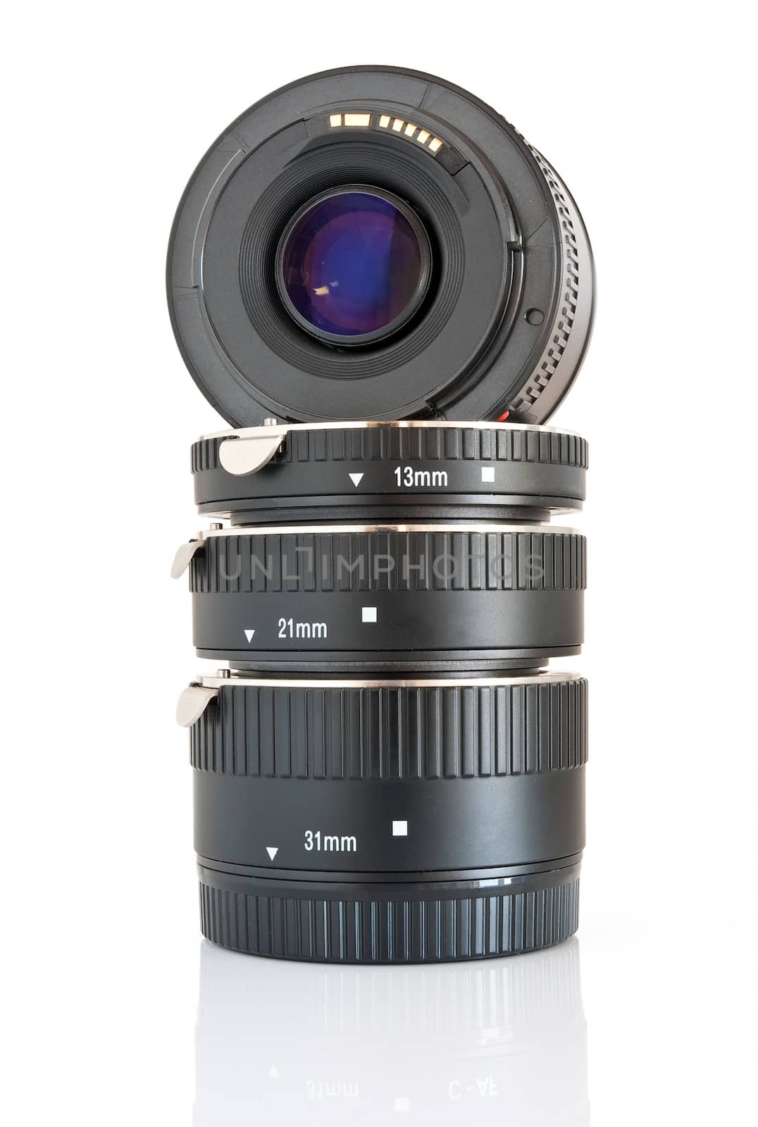 camera lens and a set of extension tube used for macro photography isolated on white background