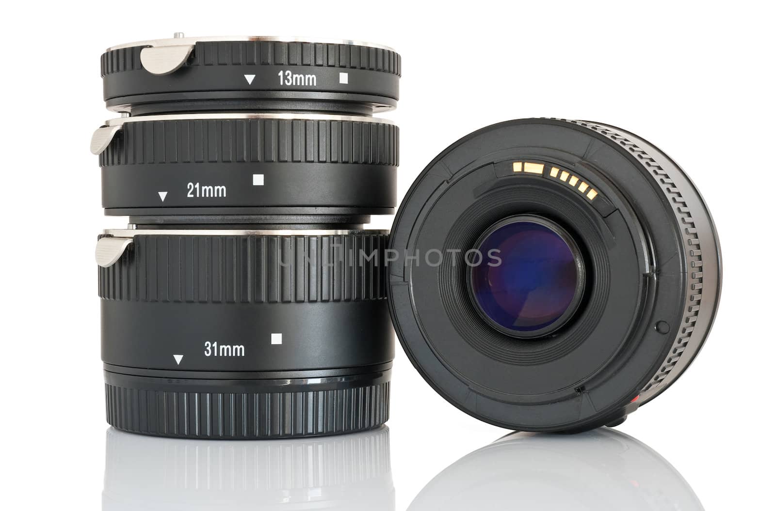 camera lens and a set of extension tube used for macro photography isolated on white background