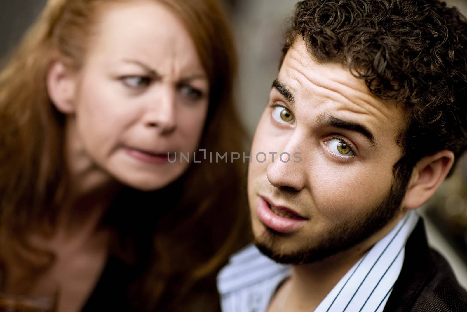 Young woman directs her anger at a man