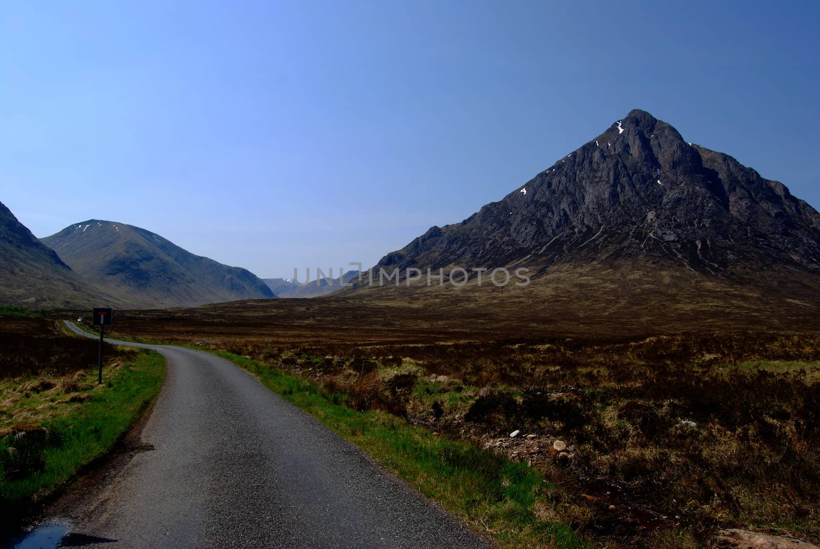 lonesome road in the beautiful Glencoe valley, Scotland