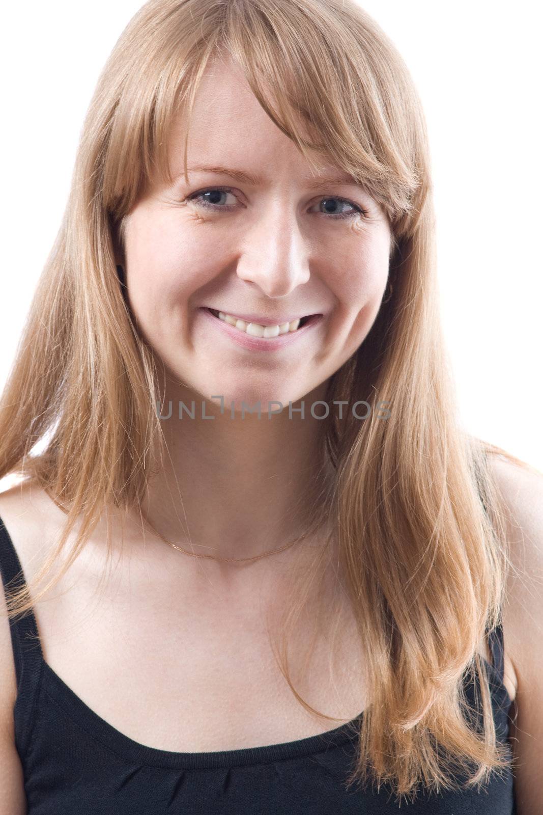 Portrait of young smiling woman. Isolated on white.