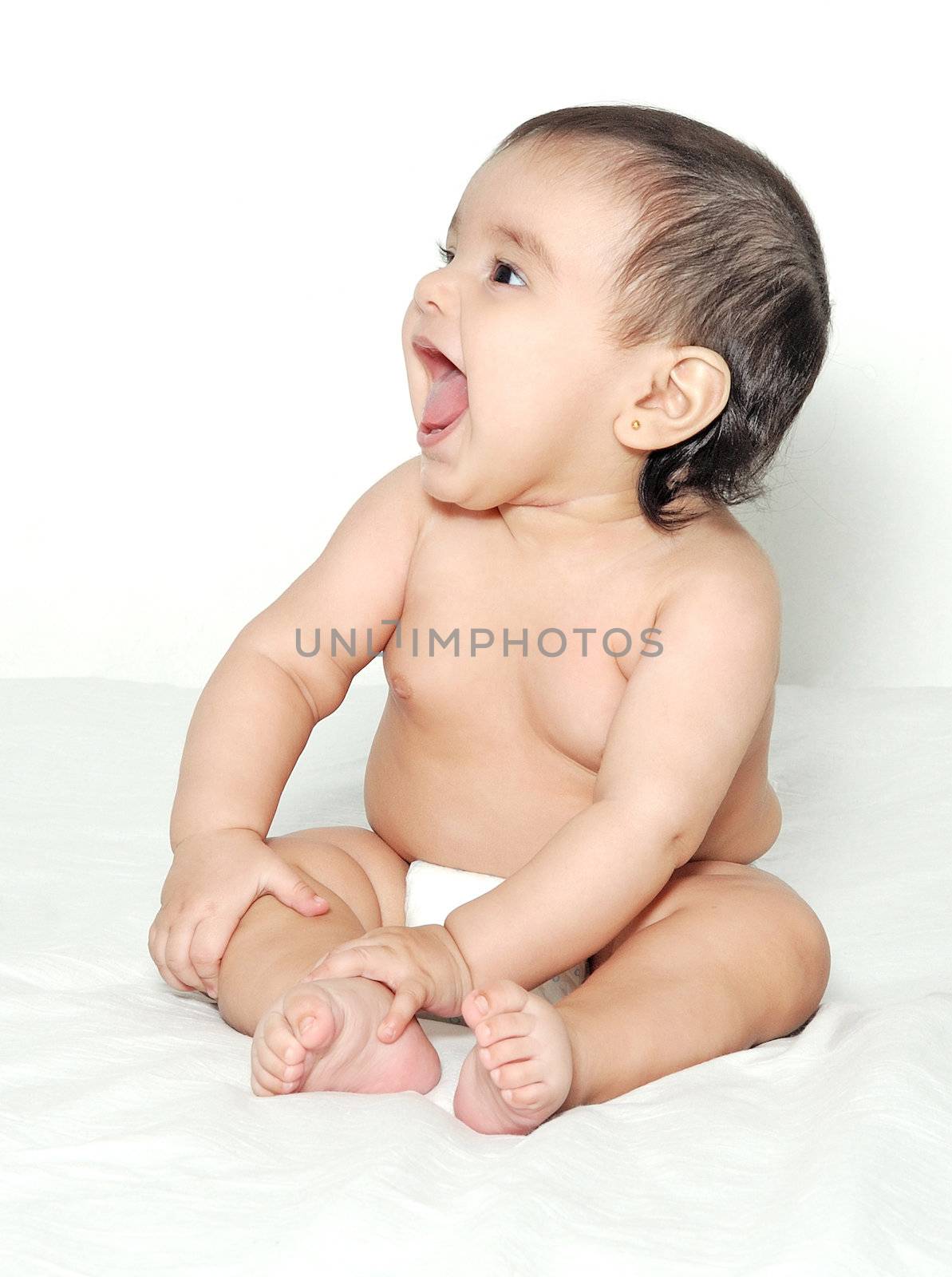  The baby of six months on a light background