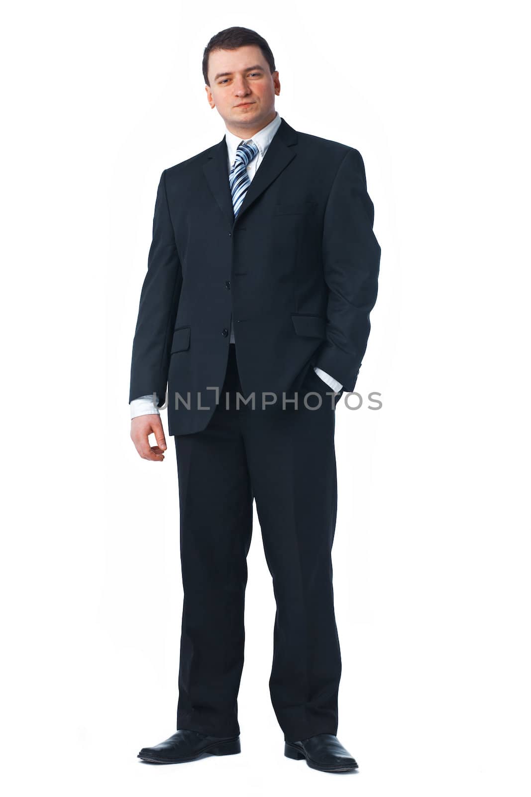 Full length of a confident young business man by romanshyshak