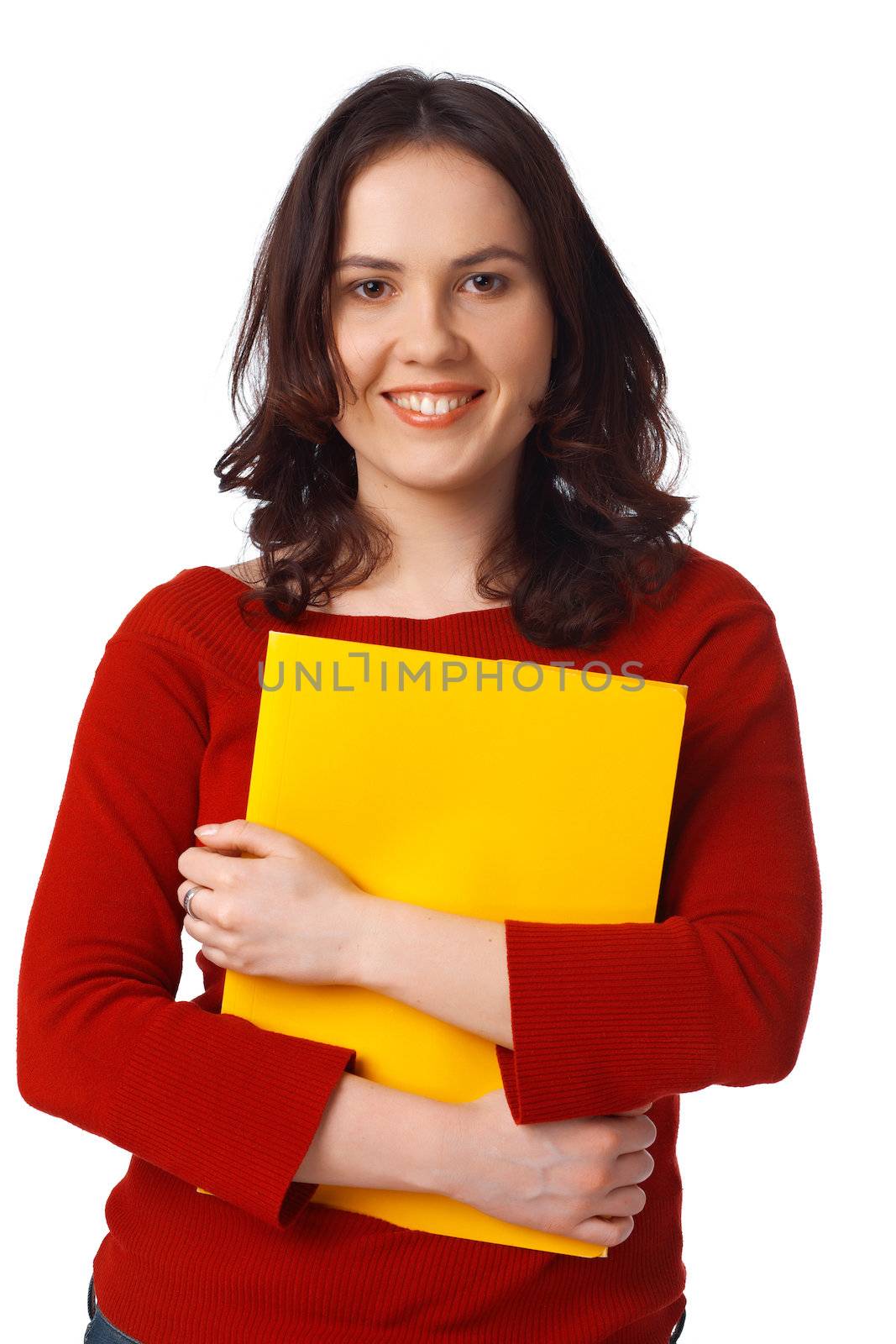 Young  female student holding a yellow folder over white background 