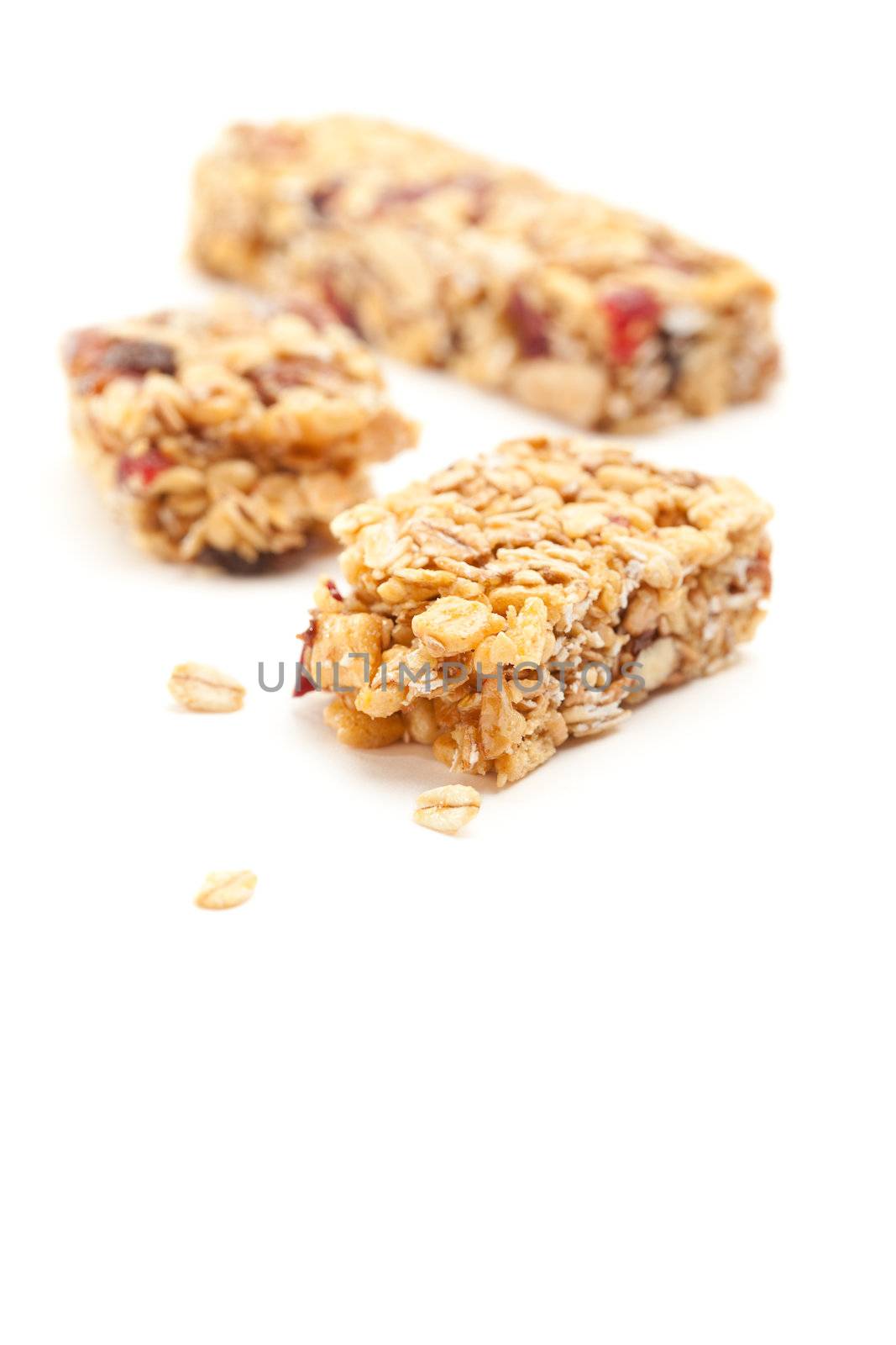 Broken Granola Bar Isolated on a White Background with Narrow Depth of Field.