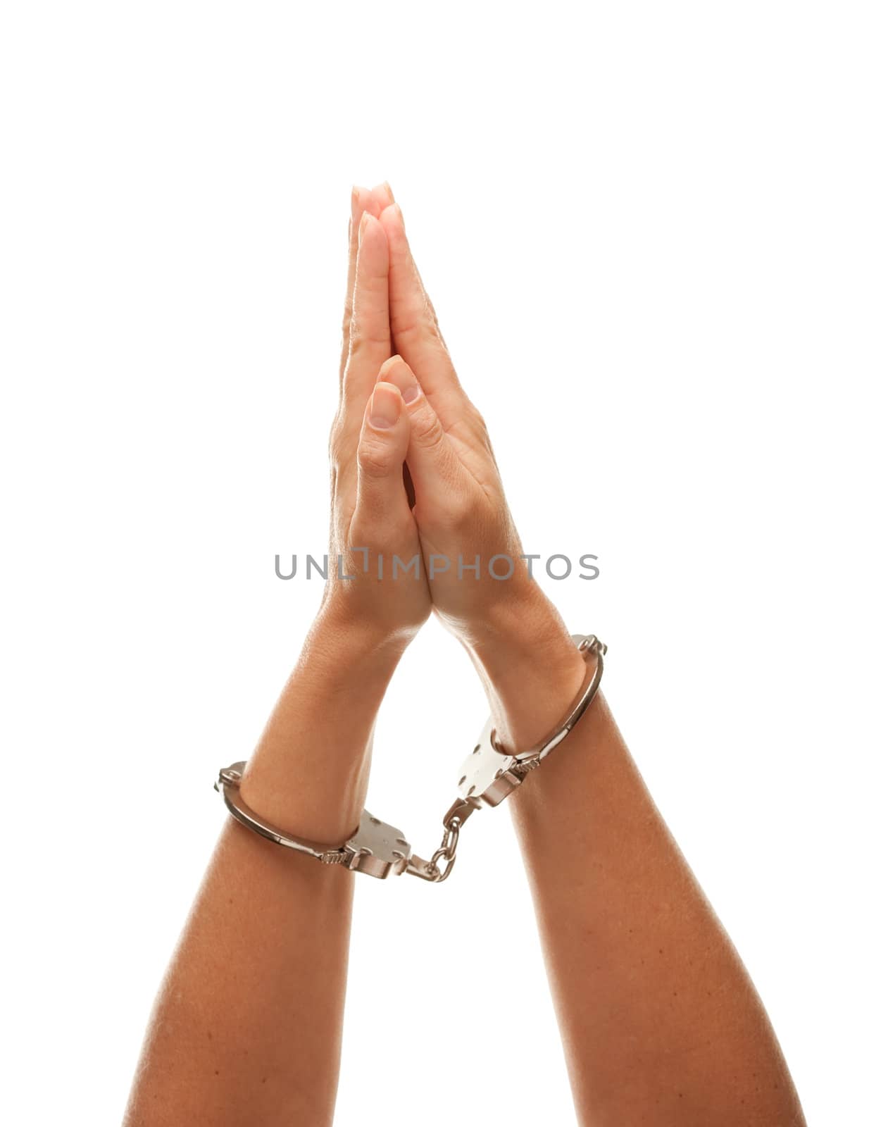 Handcuffed Woman Desperately Raising Hands in Air Isolated on a White Background.