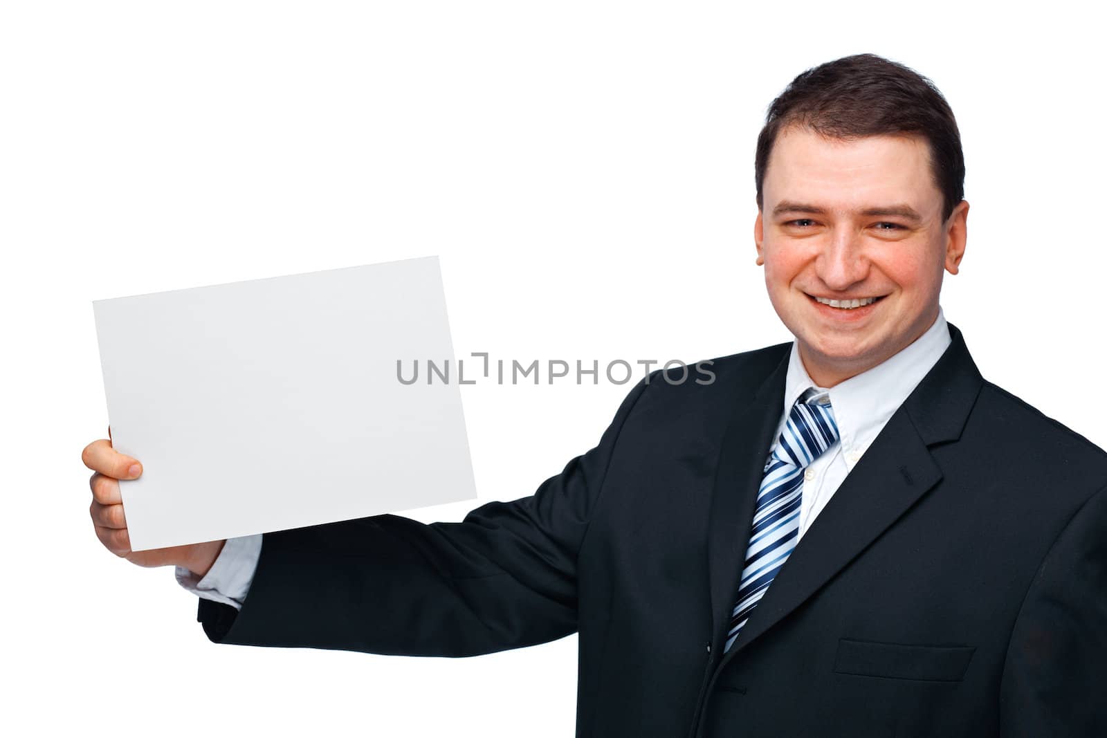 A successful happy business executive holding an empty billboard 