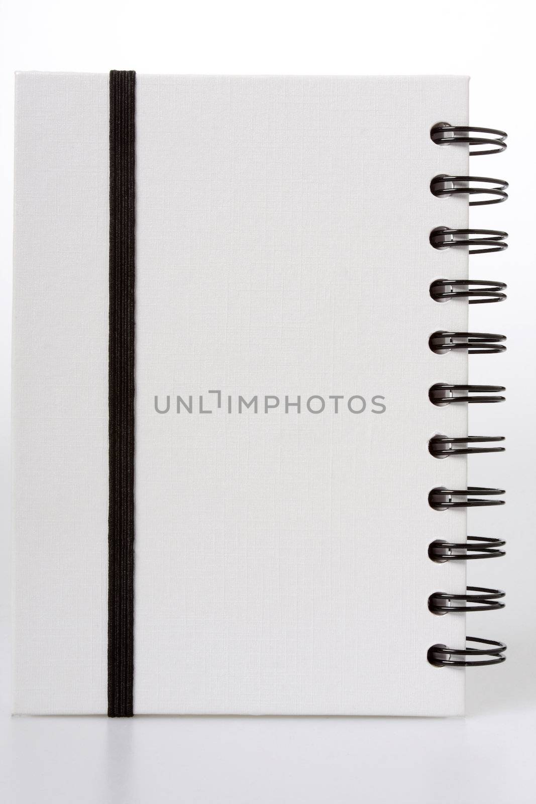 white notebook by sumos