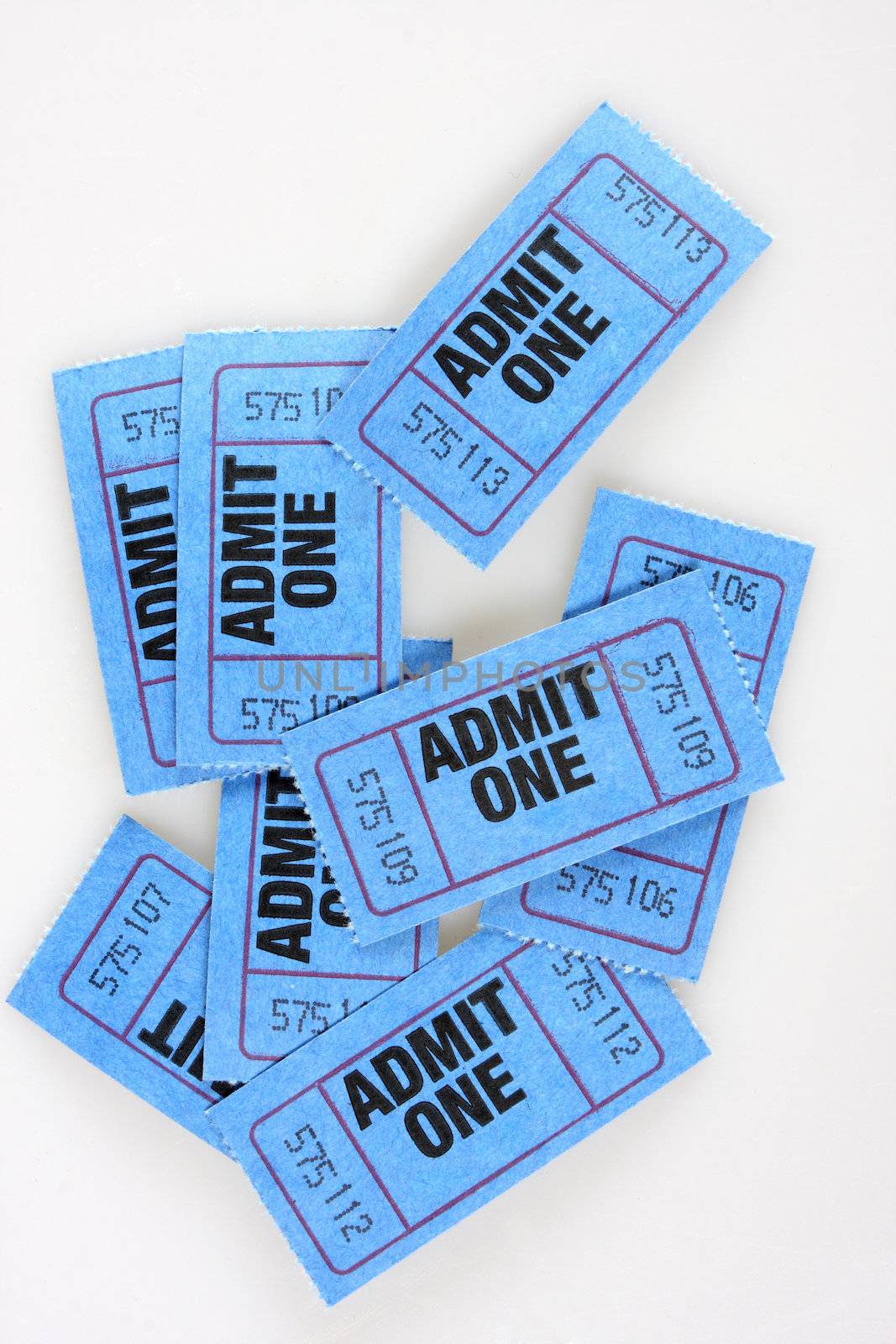 Blue admission tickets, admit one written on them