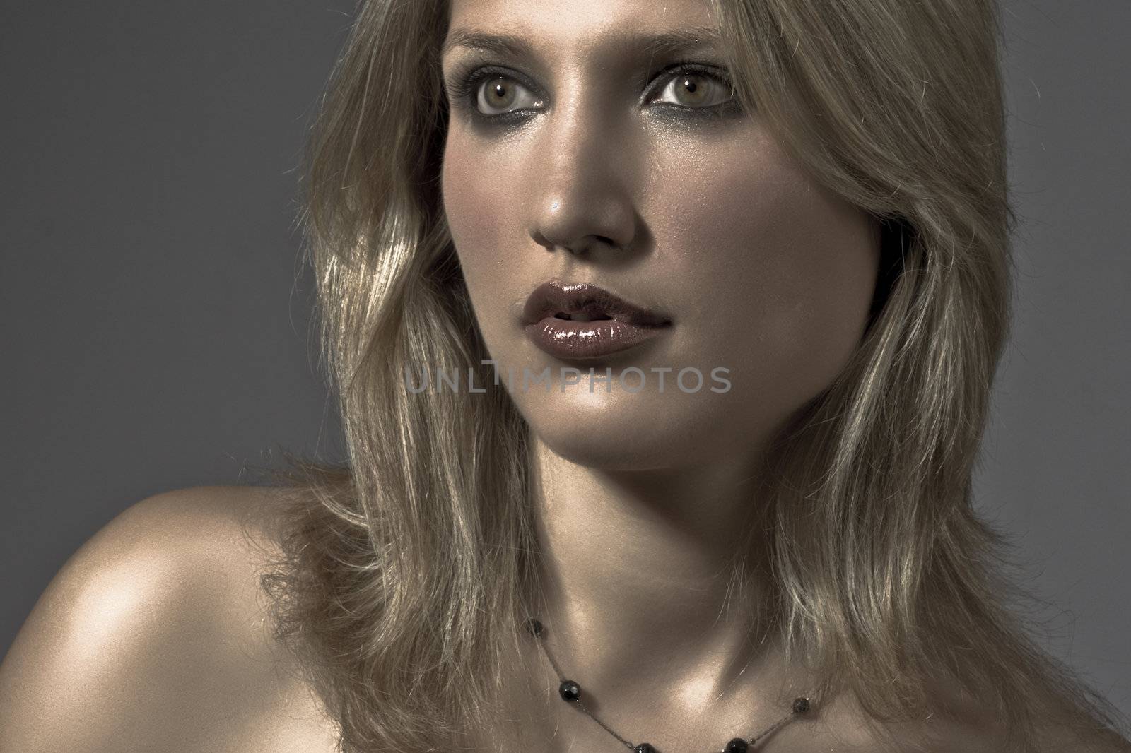 Closeup Portrait Of An Attractive Blond Woman