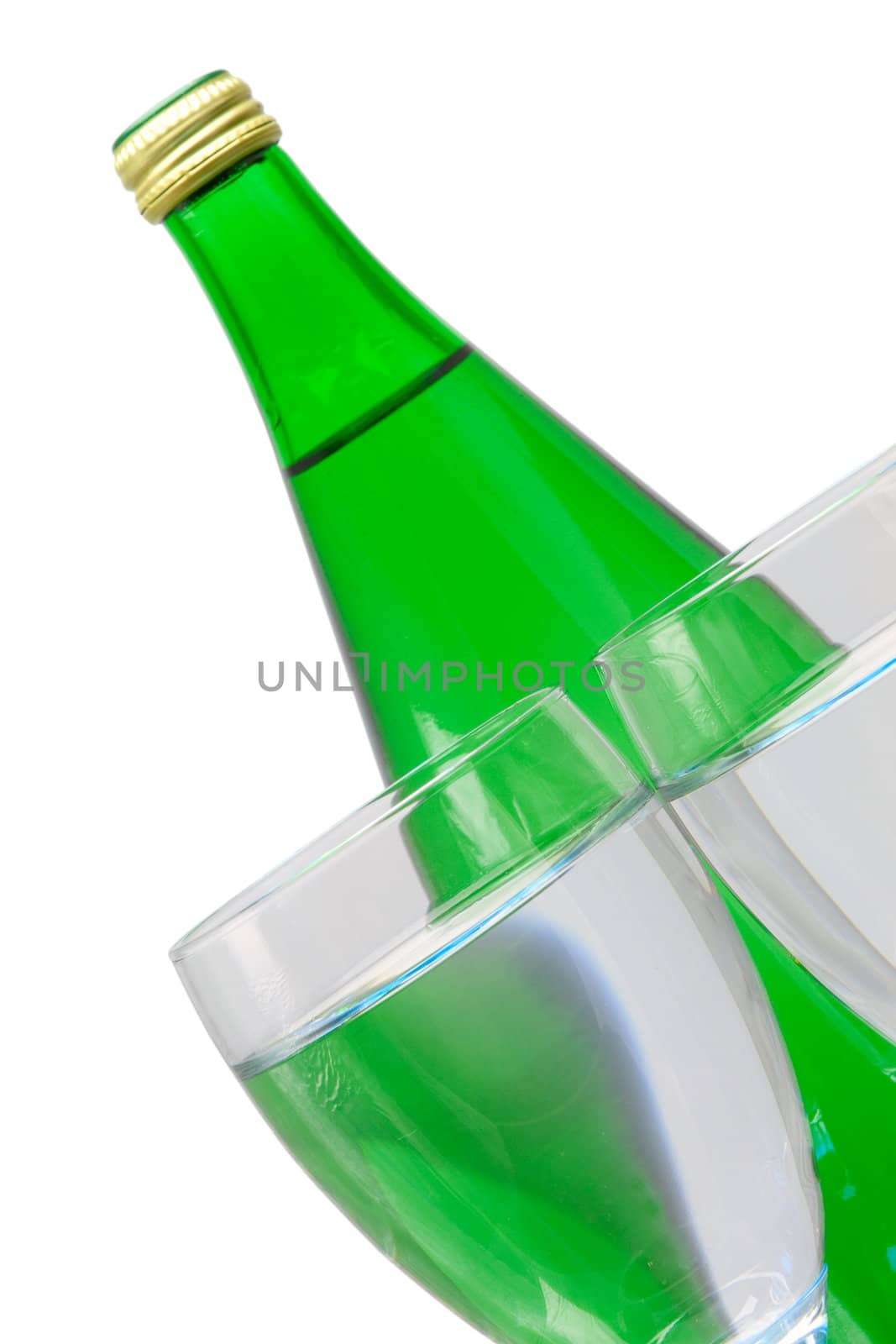 green bottle and glass of water