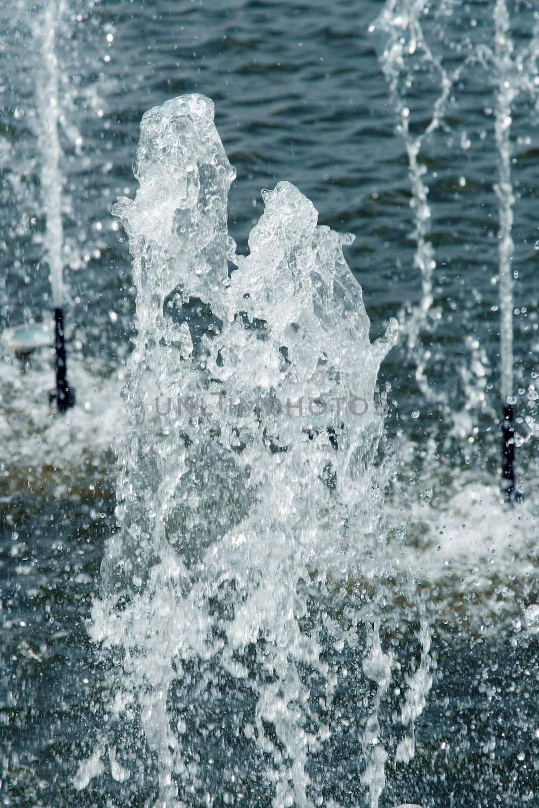 Sparks and jets of a fountain close up