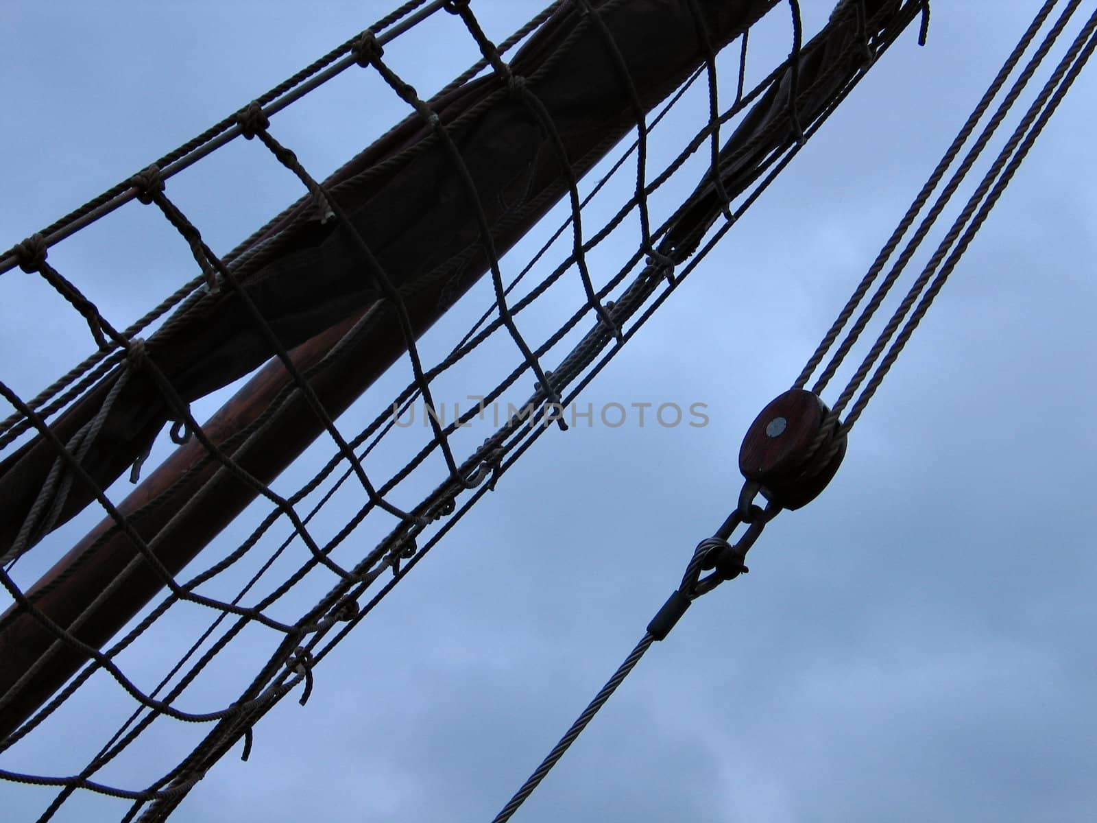 Silhouette of wooden mast of a traditional sail boat