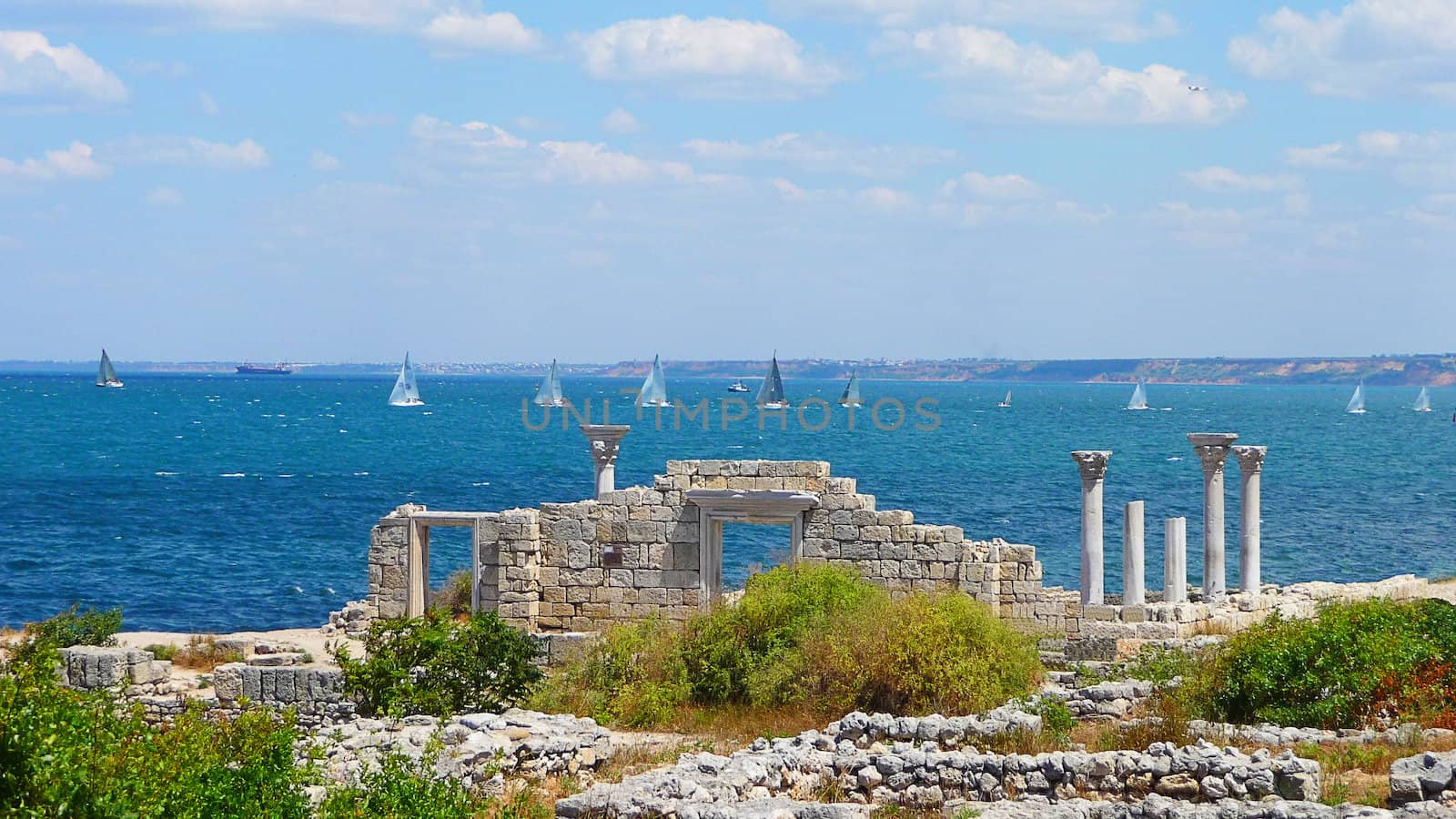 Sailing regatta at coast of Chersonese Taurian by samum