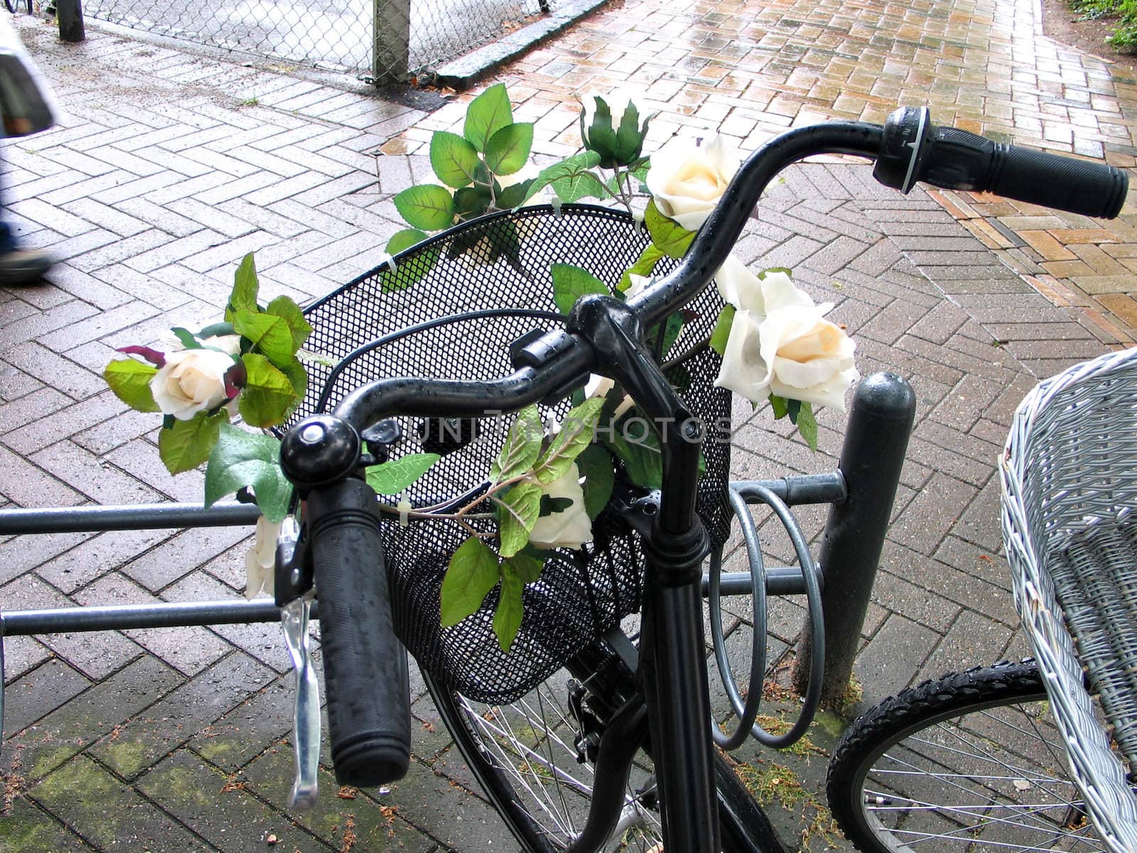 Bicycle with a basket decorated with flowers