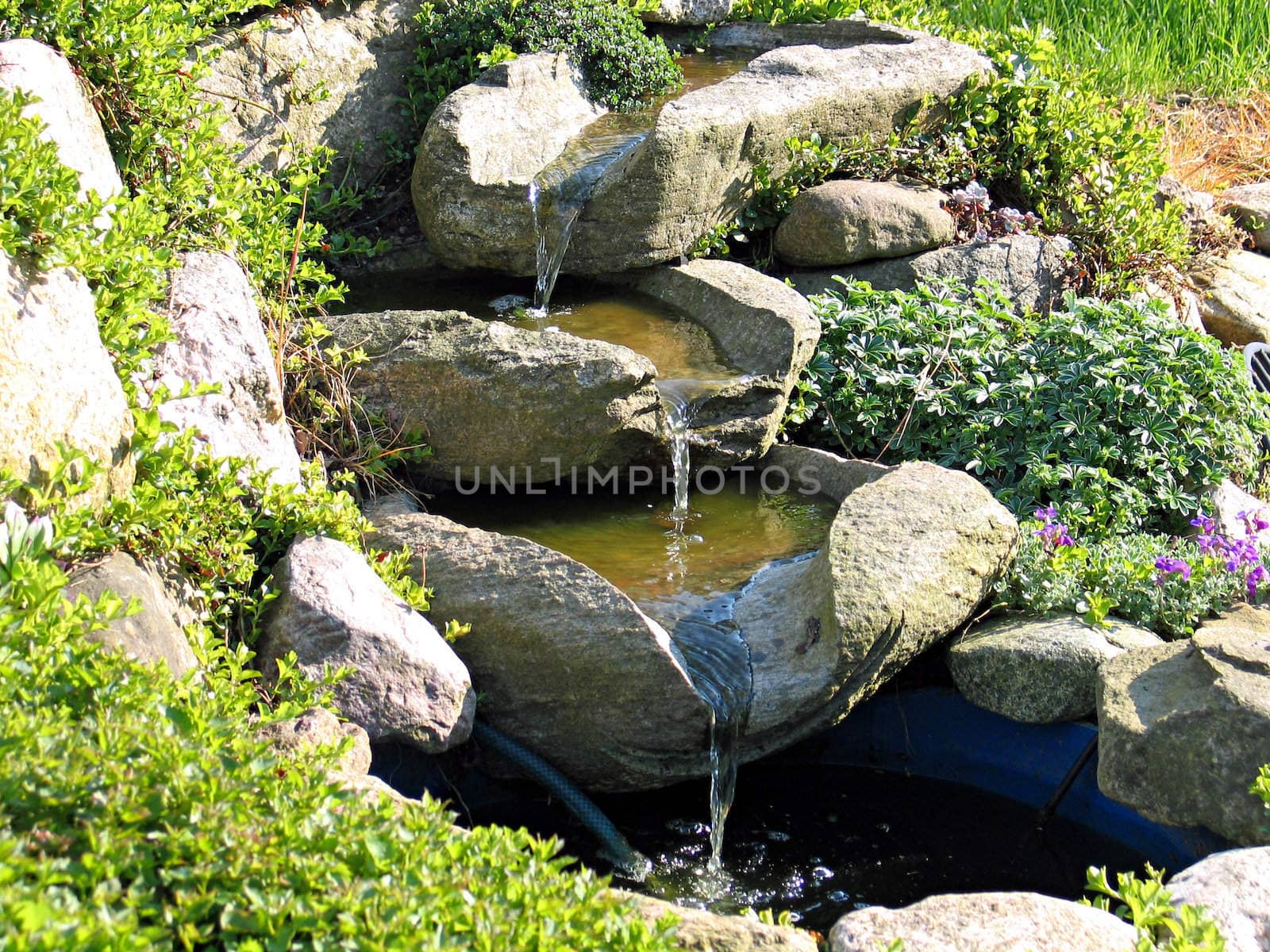 Beautiful decorative home garden stone waterfall pond