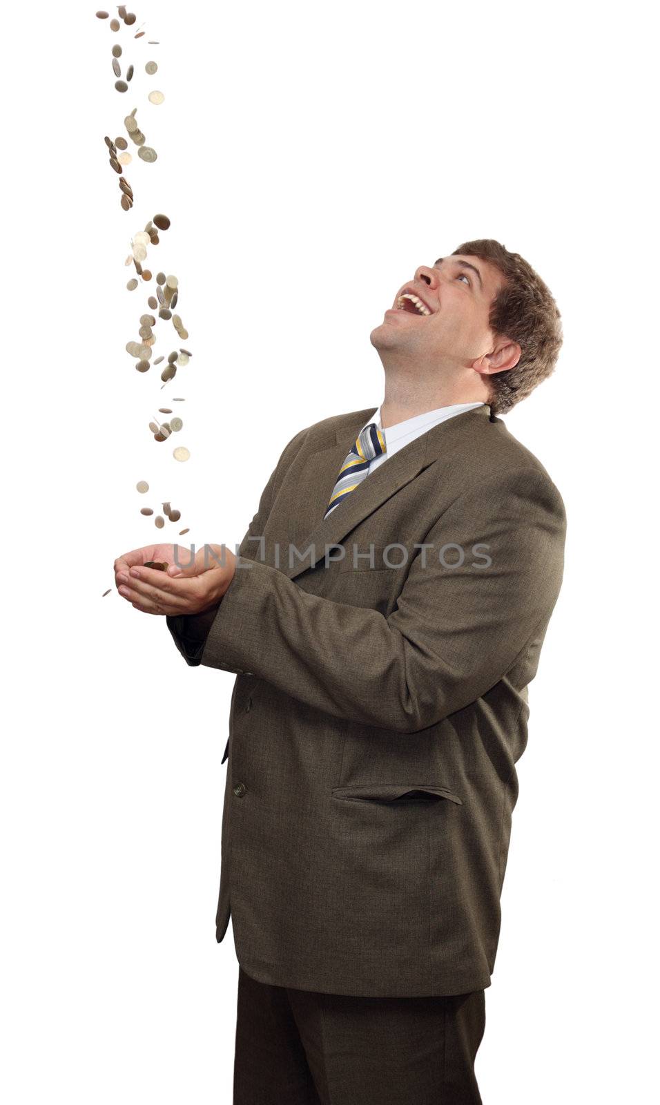 happy businessman catching falling money coins