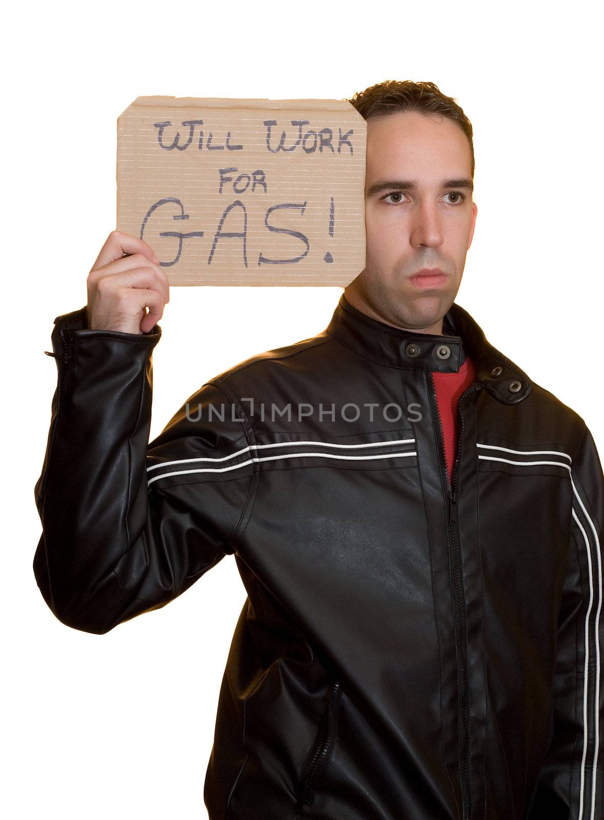 A male holding a sign saying he will work for gas, isolated on a white background