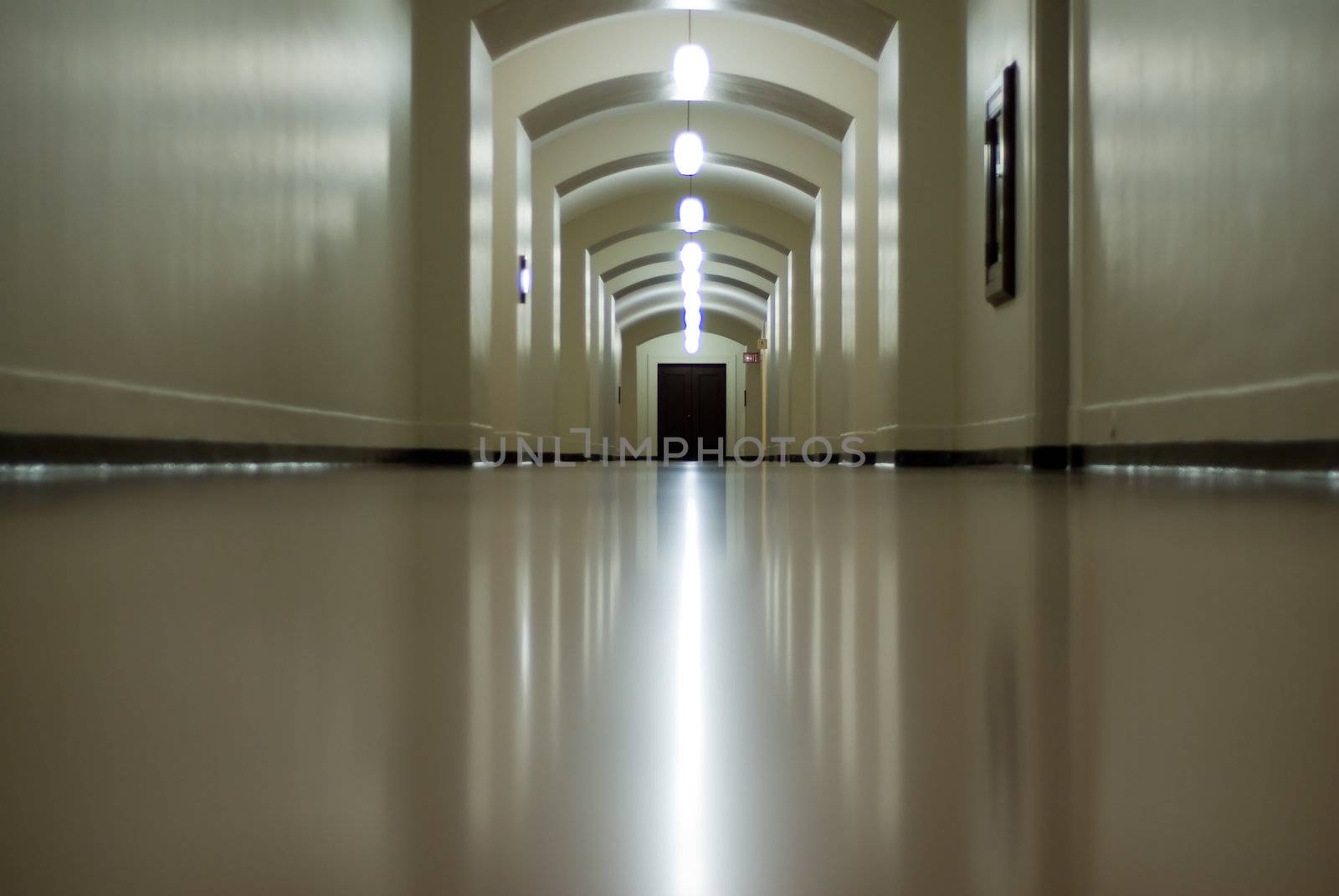 Low angle view of a hallways glossy floor