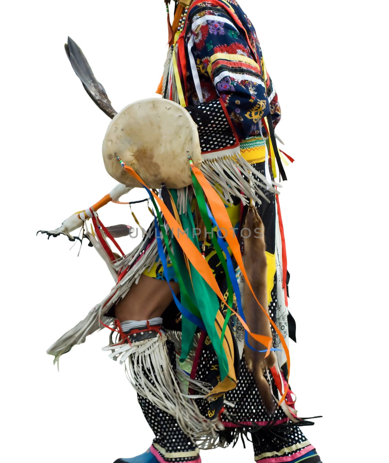 An native american dressed in traditional dance clothing, isolated on a white background