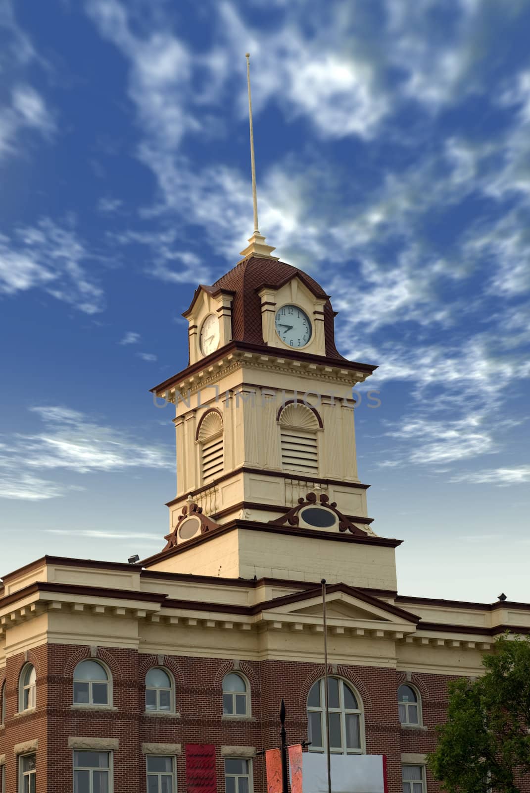 Low angle view of city hall, shot against a cloudy sky