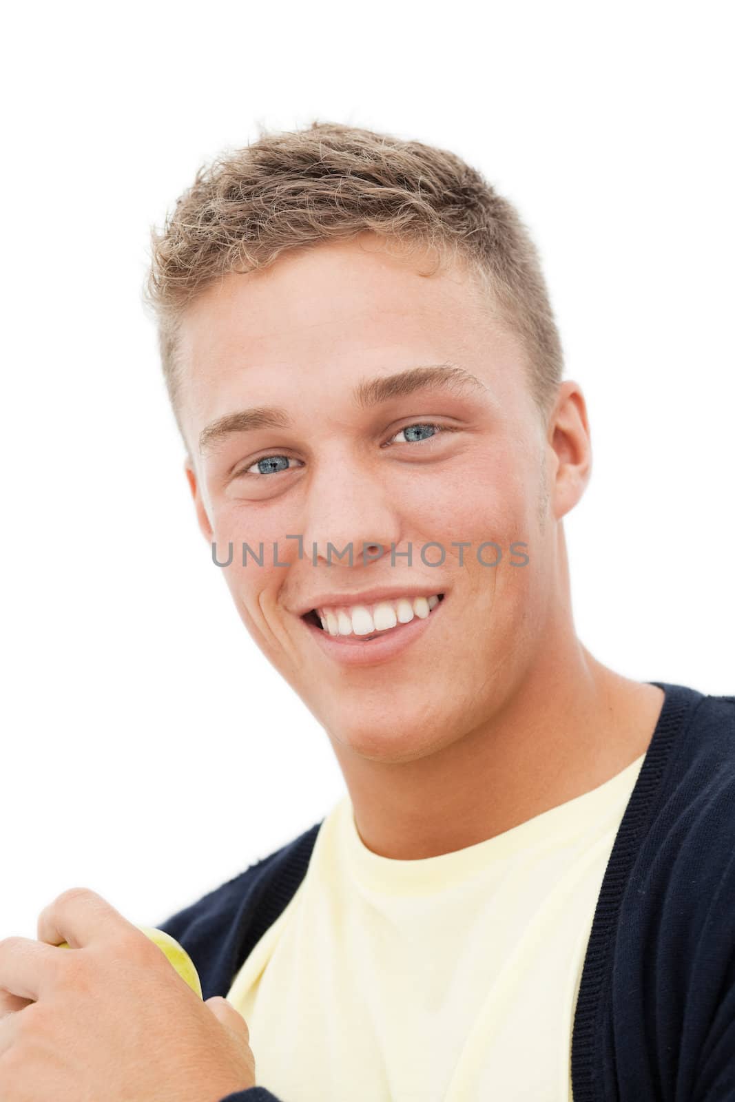 Smiling handsome man holding apple; isolated on white