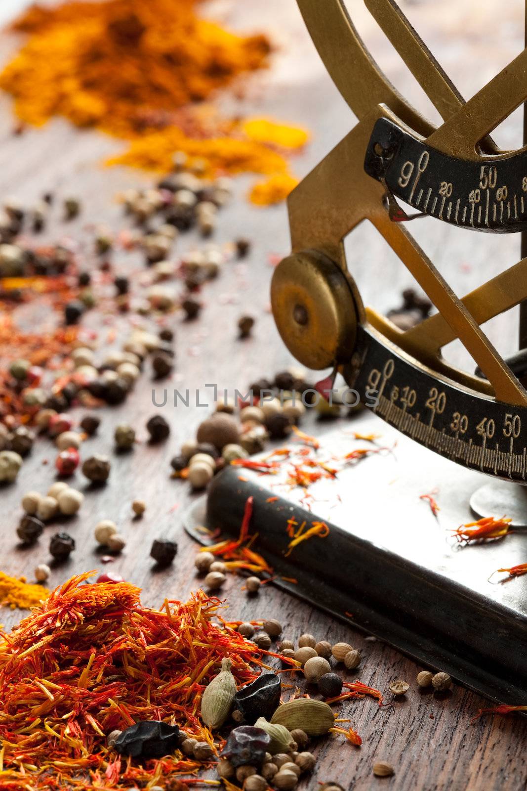 Antique scales, saffron, pepper and other spices