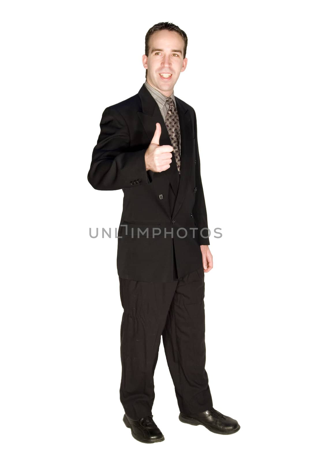 Young good looking businessman gives a thumbs up in response to a promotion
