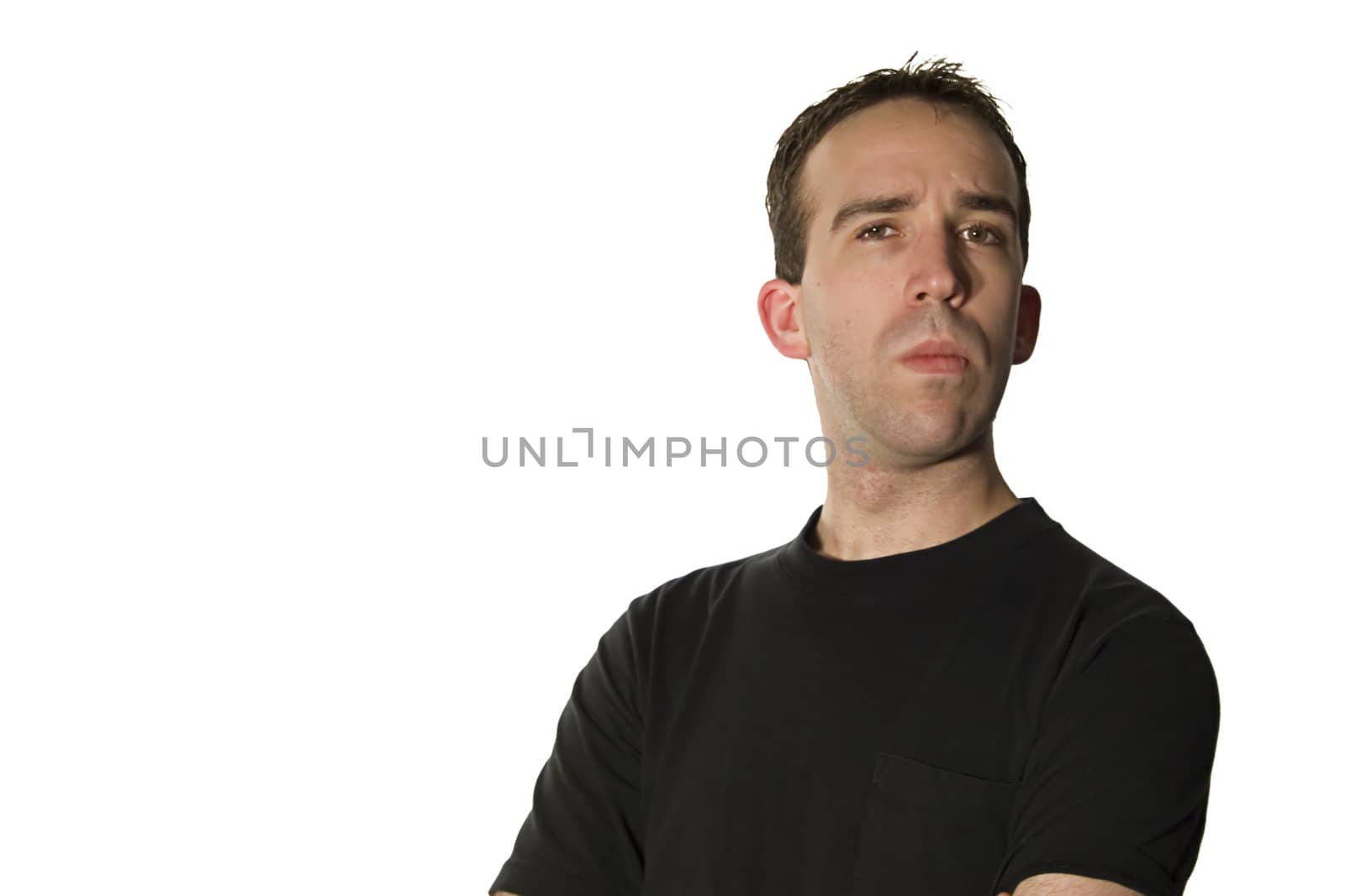 Young man pretending to be cool, wearing a black t-shirt