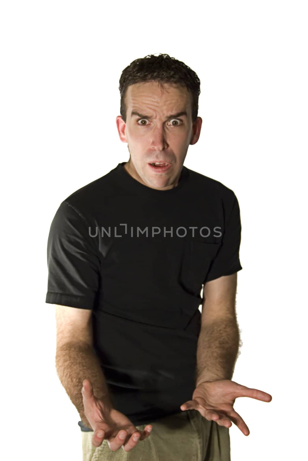 A young man with his arms stretched out and an impatient look on his face, isolated against a white background