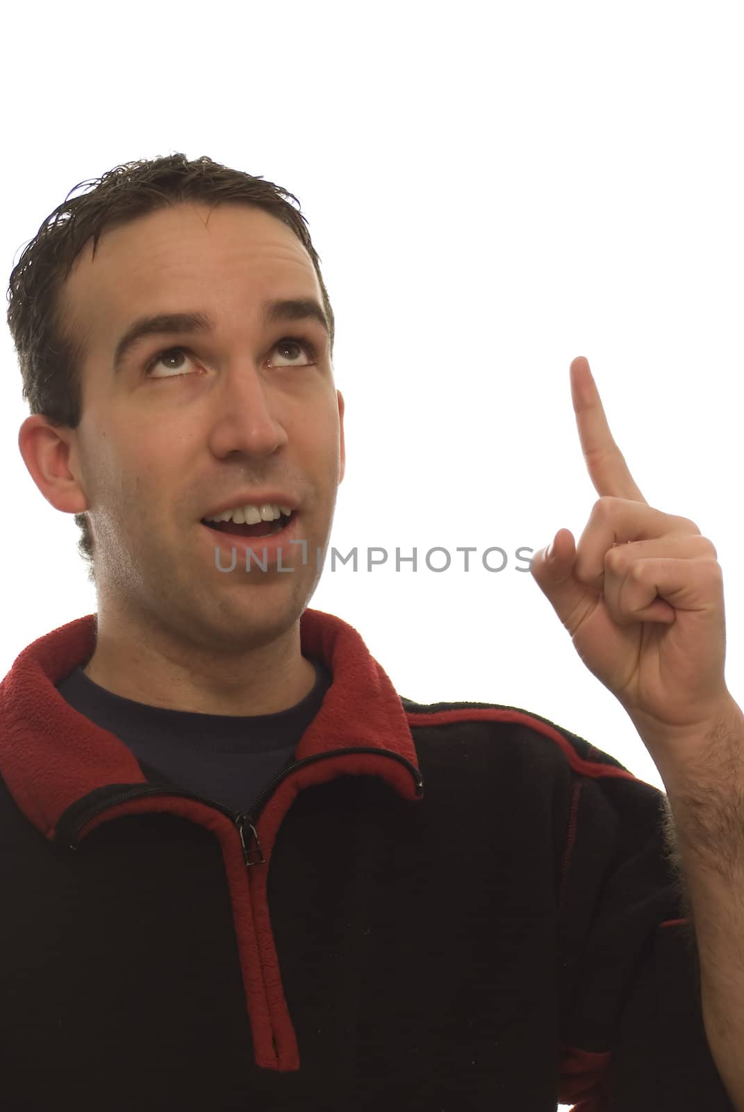 Young man looking up with his finger in the air, representing a bright idea