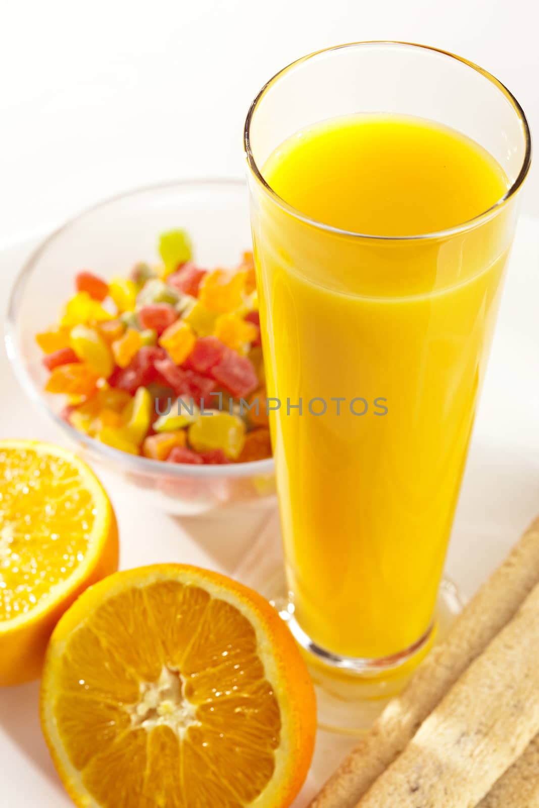 food series: ripe sliced orange and juice with pastry