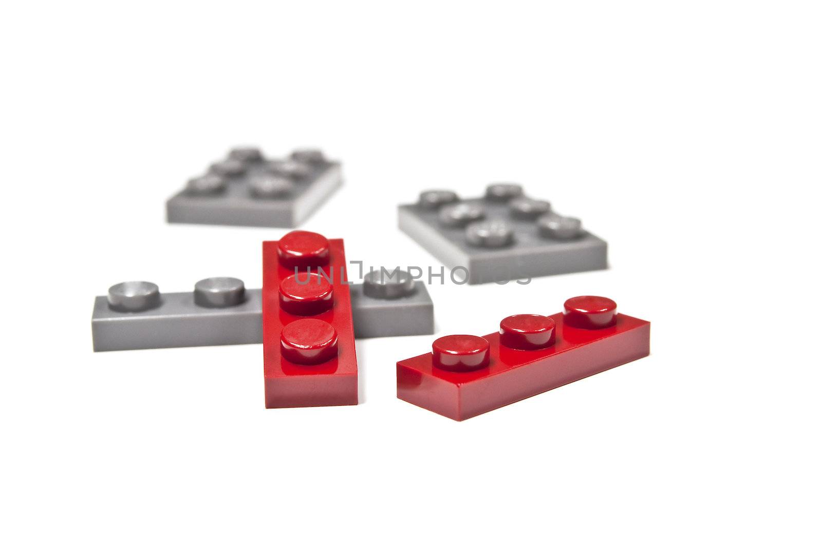 Display of isolated building blocks on white background.