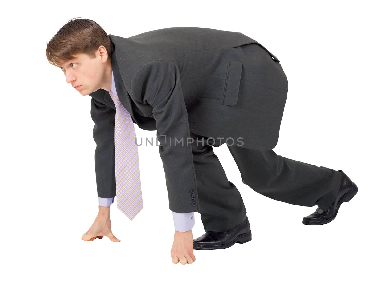 Businessman ready to compete isolated on a white background