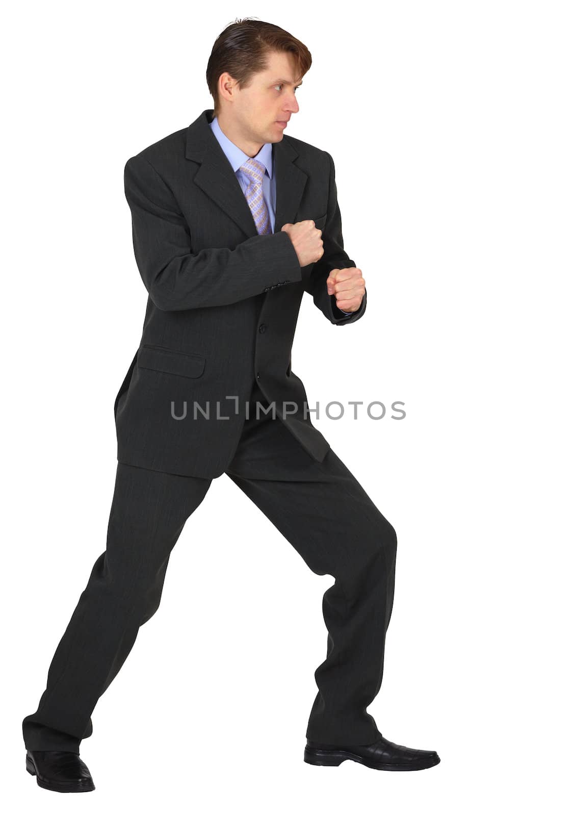 Businessman ready to fight isolated on white background